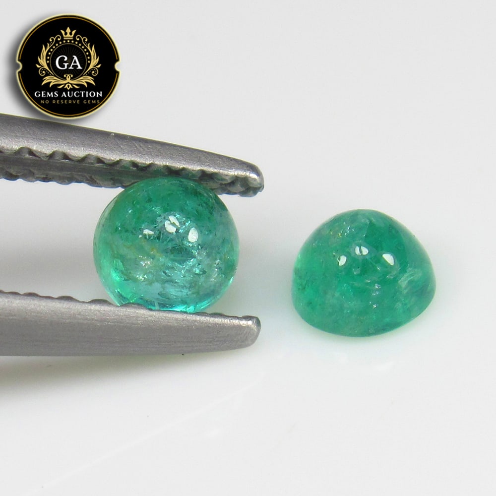0.47 Ct Natural Leafy Green Emerald Pair Loose Stones: Weight - 0.47 Ct / Size - 3.70 - 3.80 mm / 2 Pc's / Shape - Round Cab / Color - Green / Clarity - SI / Origin - Zambia / Treatment - Colorless Oil
