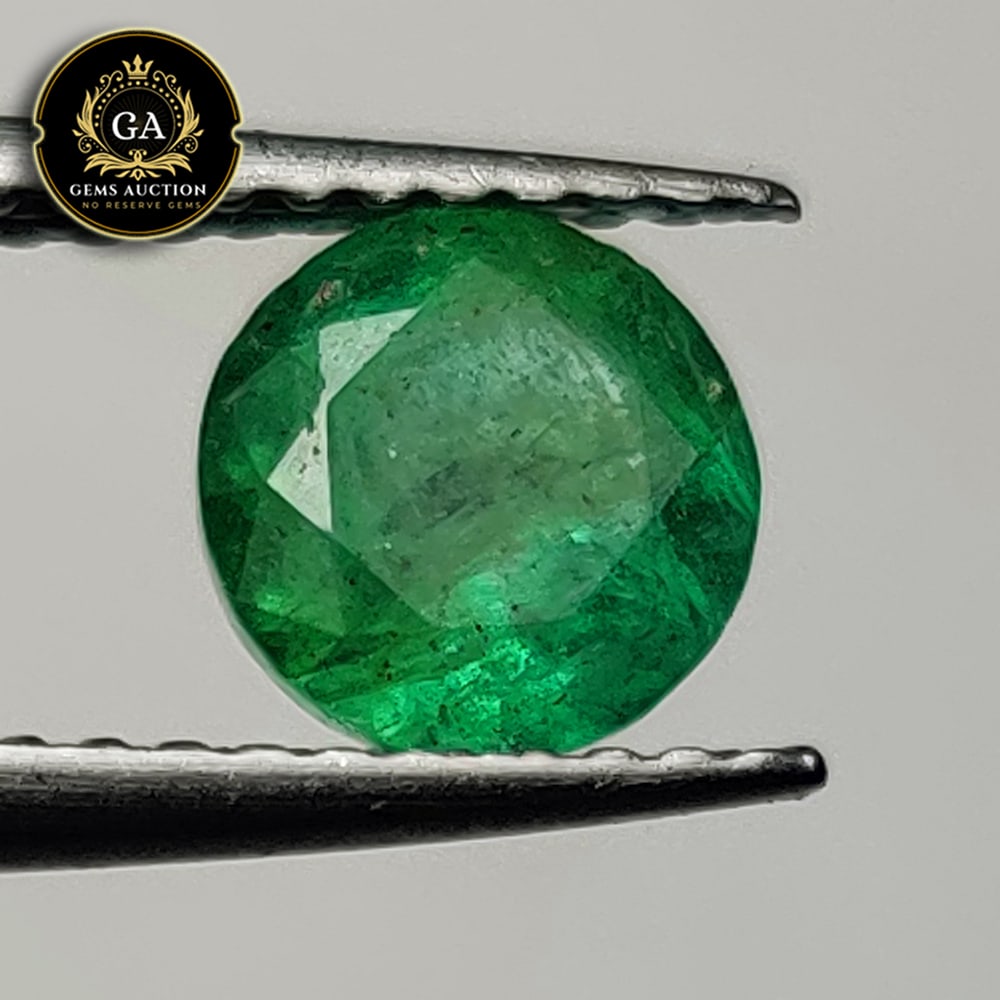 0.93 Ct Natural Zambian Emerald Round Cut Loose Stone: Weight - 0.93 Ct / Size - 6.20 x 6.20 x 4.20 mm / Shape - Round Cut / Color - Green / Clarity - SI / Origin - Zambia / Treatment - Colorless Oil