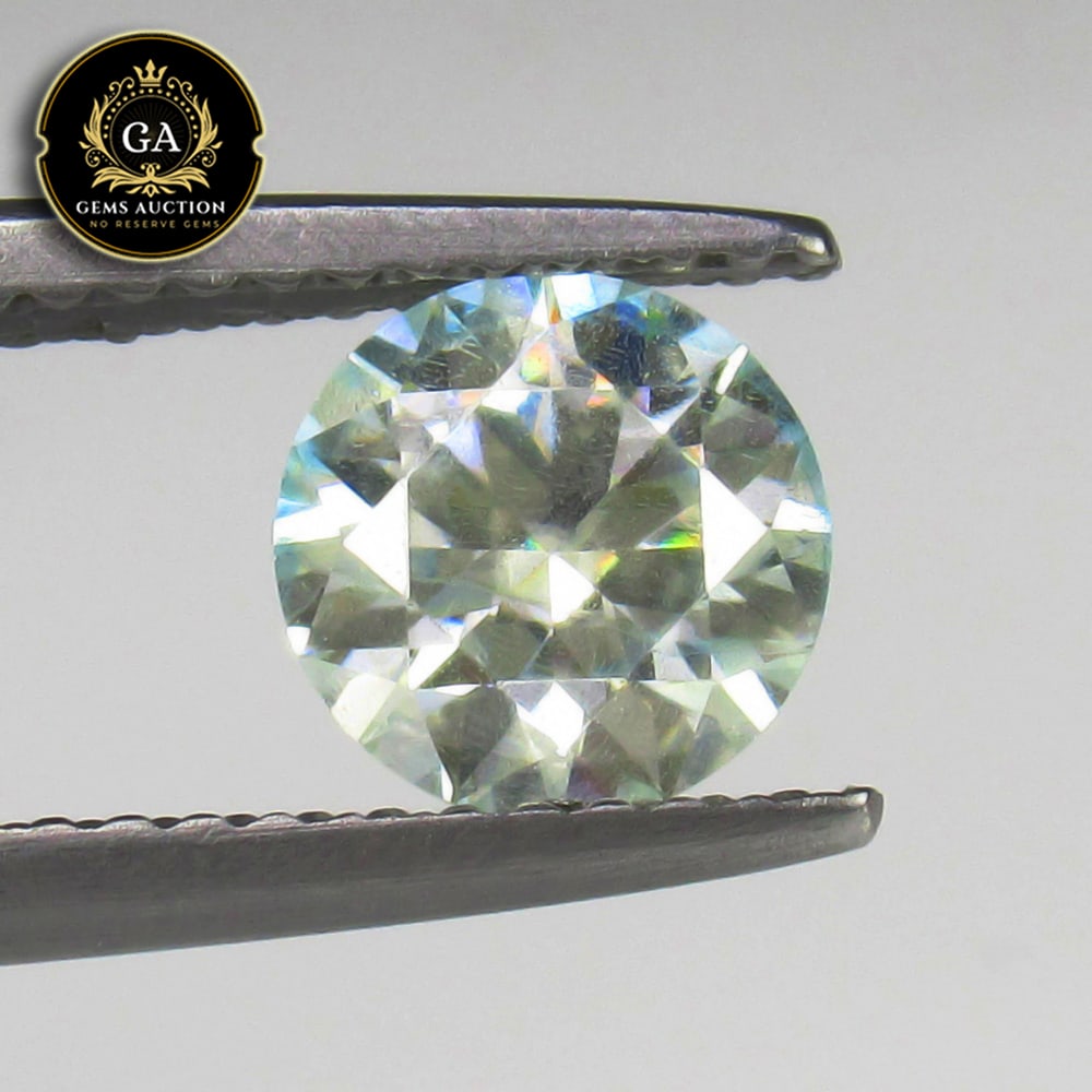 0.93 Ct Lab Created Moissanite Round Diamond Cut: Weight - 0.93 Ct / Size - 6.60 x 6.60 x 4.00 mm / Shape - Round Cut / Color - White / Clarity - VVS / Origin - Turkey / Treatment - Lab Created