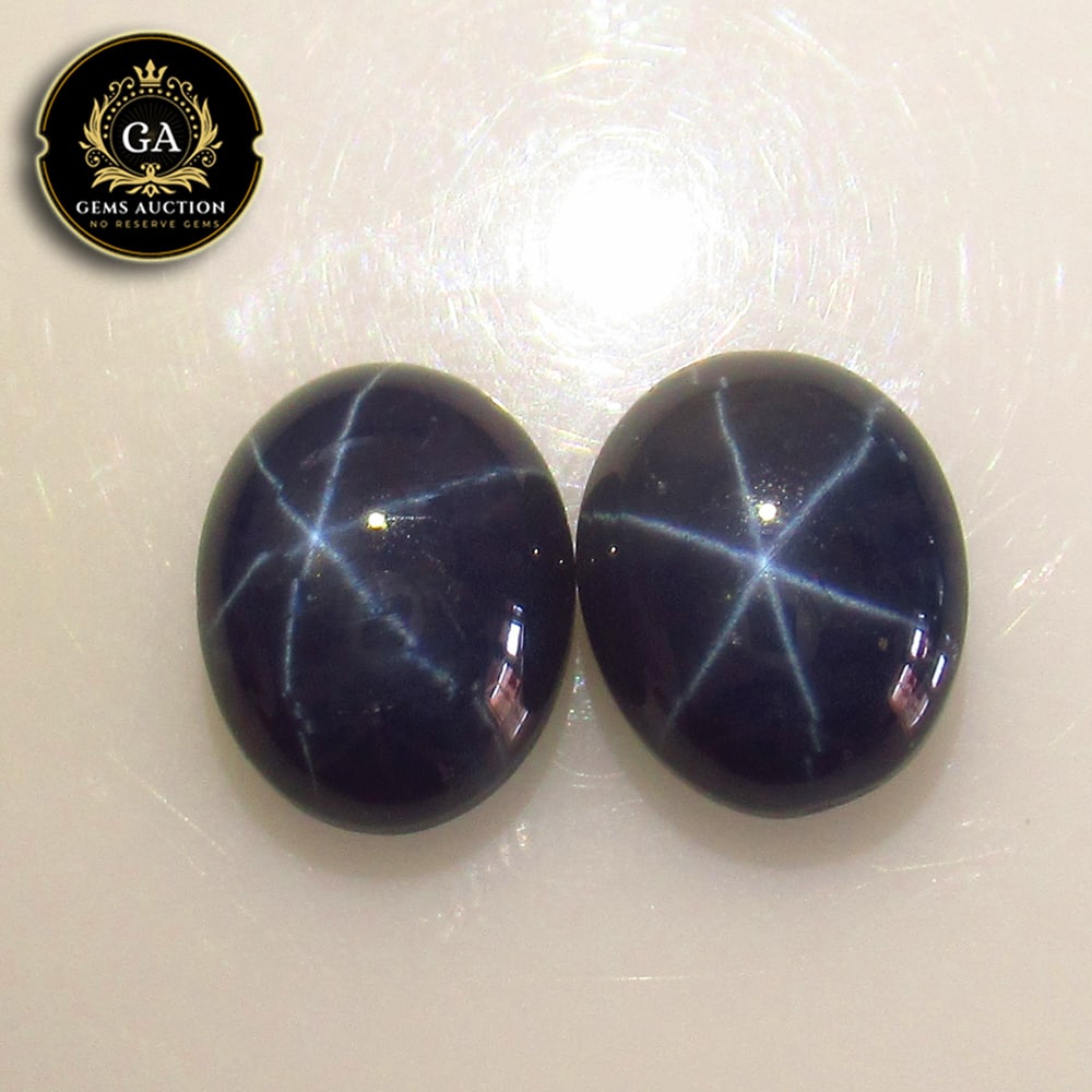 8.37 Ct Natural Blue Star Sapphire Oval Pair: Weight - 8.37 Ct / Size- 10.00 x 8.00 x 4.70 mm / 2 Pc's / Shape - Oval Cab / Clarity - Opaque / Origin - India / Treatment - Heated With Glass Filled