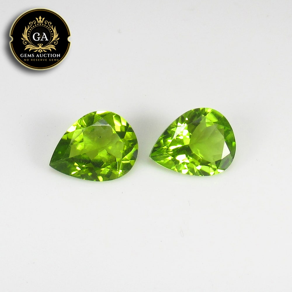 4.18 Ct Natural Good Green Peridot Pear Cut Pair: Weight - 4.18 Ct / Size - 10.00 x 8.00 x 4.20 mm / 2 Pc's / Shape - Pear Cut / Color - Green / Clarity - VVS / Origin - Pakistan / Treatment - None