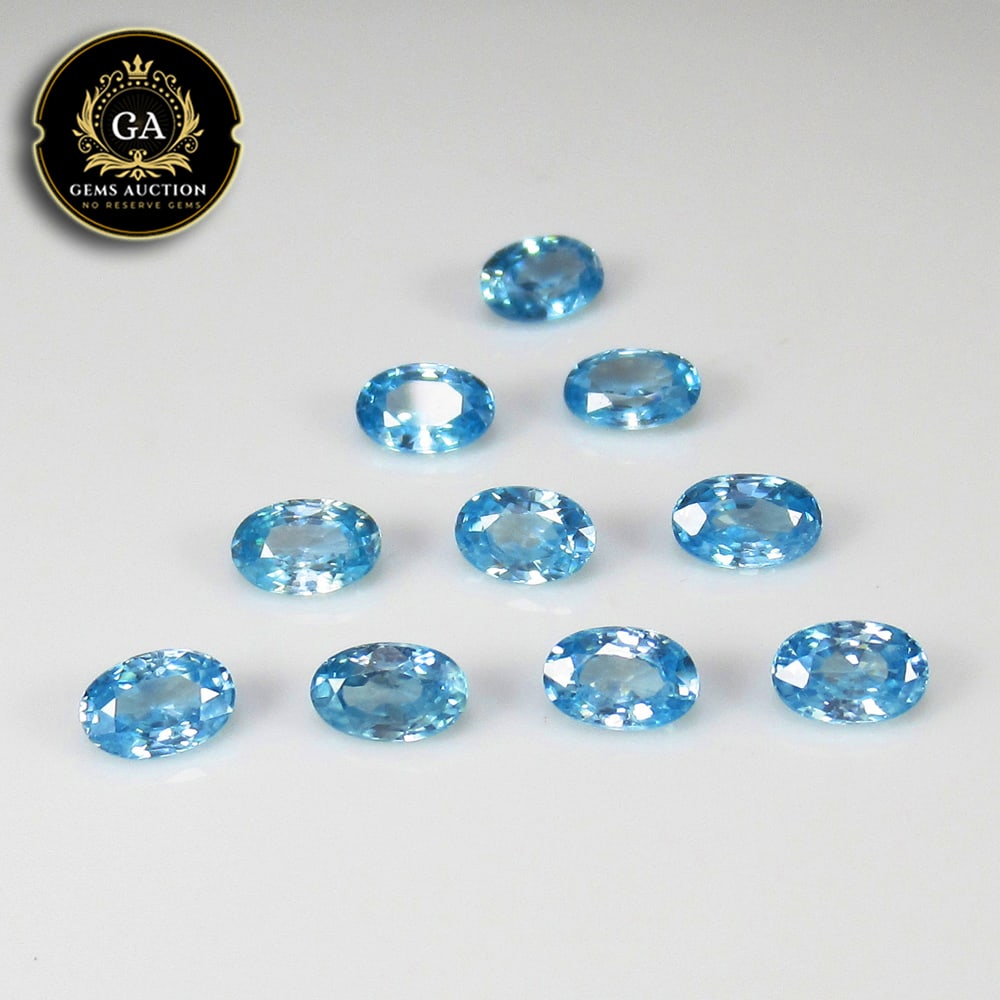 6.42 Ct Natural Blue Zircon Oval Jewellery Set: Weight - 6.42 Ct / Size - 6.0x4.0 - 6.2x4.2 mm / 10 Pc's / Shape - Oval Cut / Color - Blue / Clarity - VVS / Origin - Cambodia / Treatment - Gentle Heat