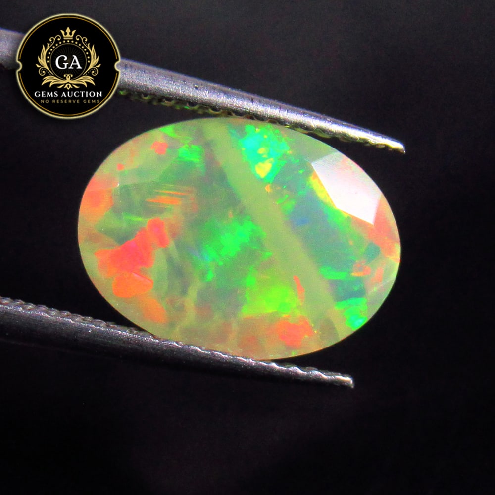 2.06 Ct Natural Ethiopian Multicolor Welo Opal Oval Cut (1 of 3)