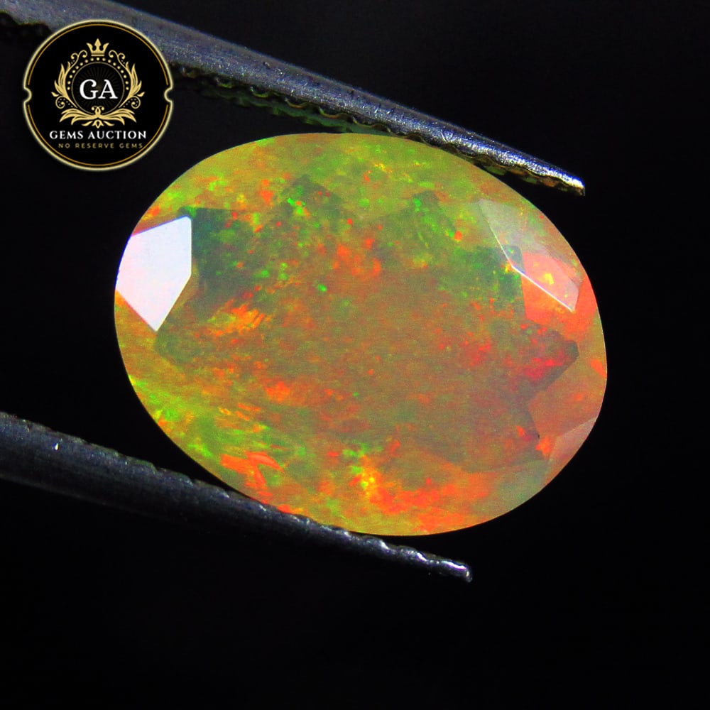 2.48 Ct Natural Ethiopian Multicolor Welo Opal Oval Cut (1 of 3)