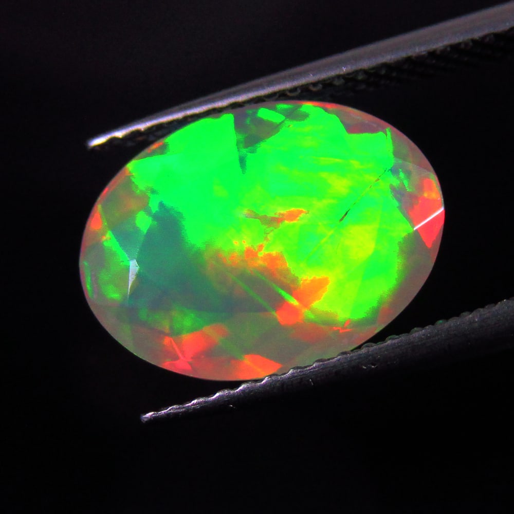 2.93 Ct Natural Ethiopian Multicolor Welo Opal Oval Cut (1 of 3)