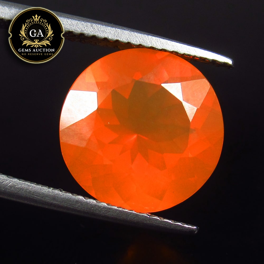 4.24 Ct Natural Fanta Orange Spessarite Garnet Round Cut: Weight - 4.24 Ct / Size - 12.00 x 12.00 x 8.00 mm / Shape - Round Cut / Clarity - SI / Origin - Madagascar / Treatment - None