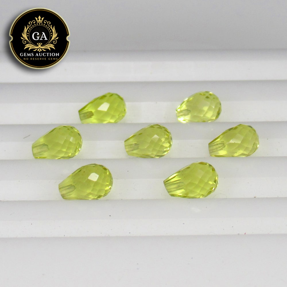 5.00 Ct Natural Loupe Clean Lemon Quartz Pear Drop Beads: Weight - 5.00 Ct / Size - 6.0x4.0 - 6.1x4.1 mm / 7 Pc's / Shape - Pear Drop Beads / Clarity - VVS / Origin - Brazil / Treatment - None