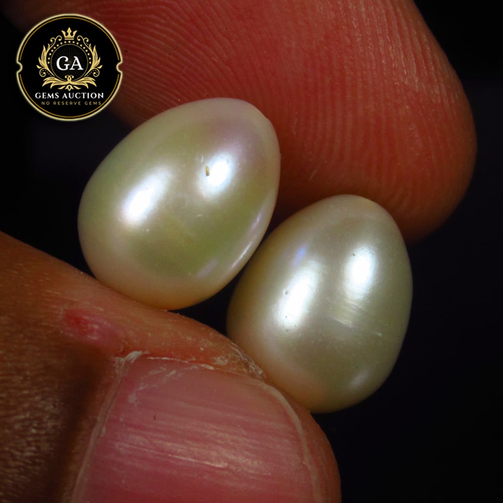 11.30 Ct Natural Fresh Water Pearl Egg Shaped Beads: Weight - 11.30 Ct / Size - 11.00 x 8.50 x 8.50 mm / 2 Pc's / Shape - Drilled Dumble Beads / Color - White / Clarity - OPaque / Origin - India / Treatment - None