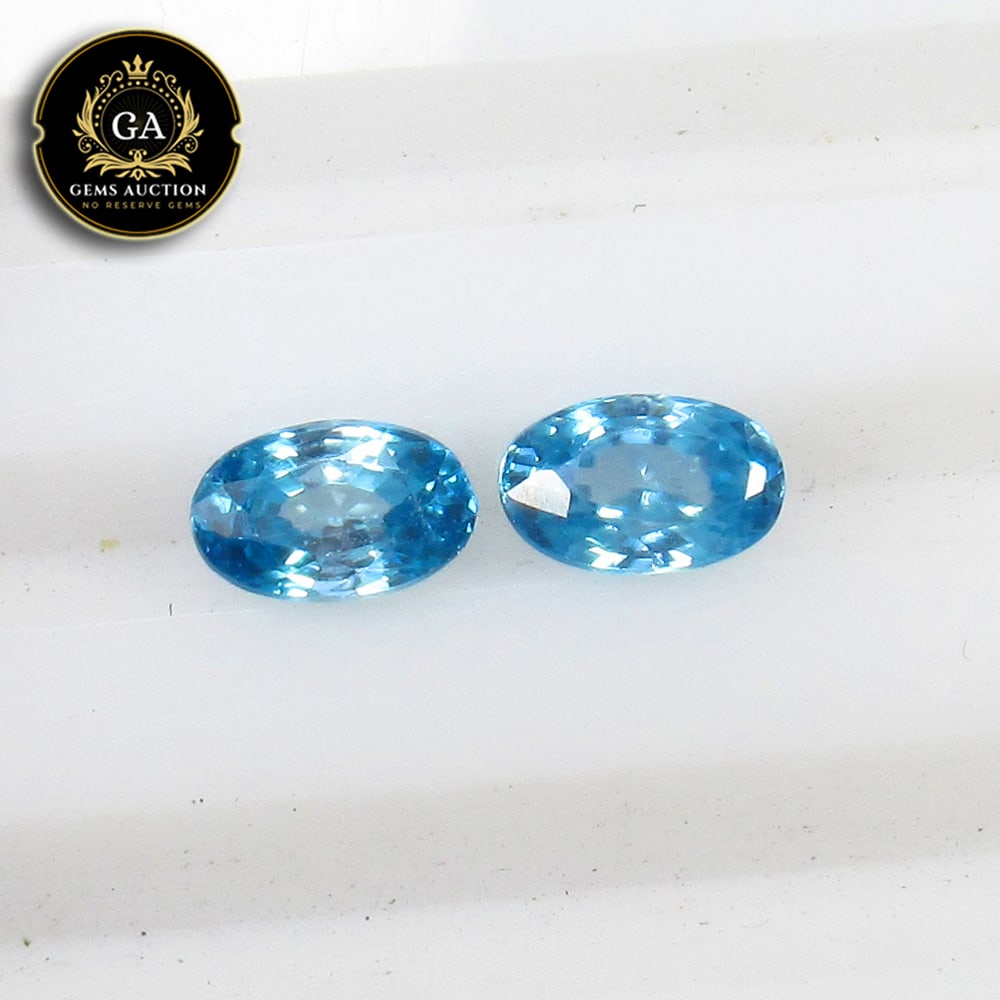 1.51 Ct Natural Blue Zircon Oval Cut Pair: Weight - 1.51 Ct / Size - 6.00 x 4.00 x 2.60 mm / 2 Pc's / Shape - Oval Cut / Color - Blue / Clarity - VVS / Origin - Cambodia / Treatment - Gentle Heat