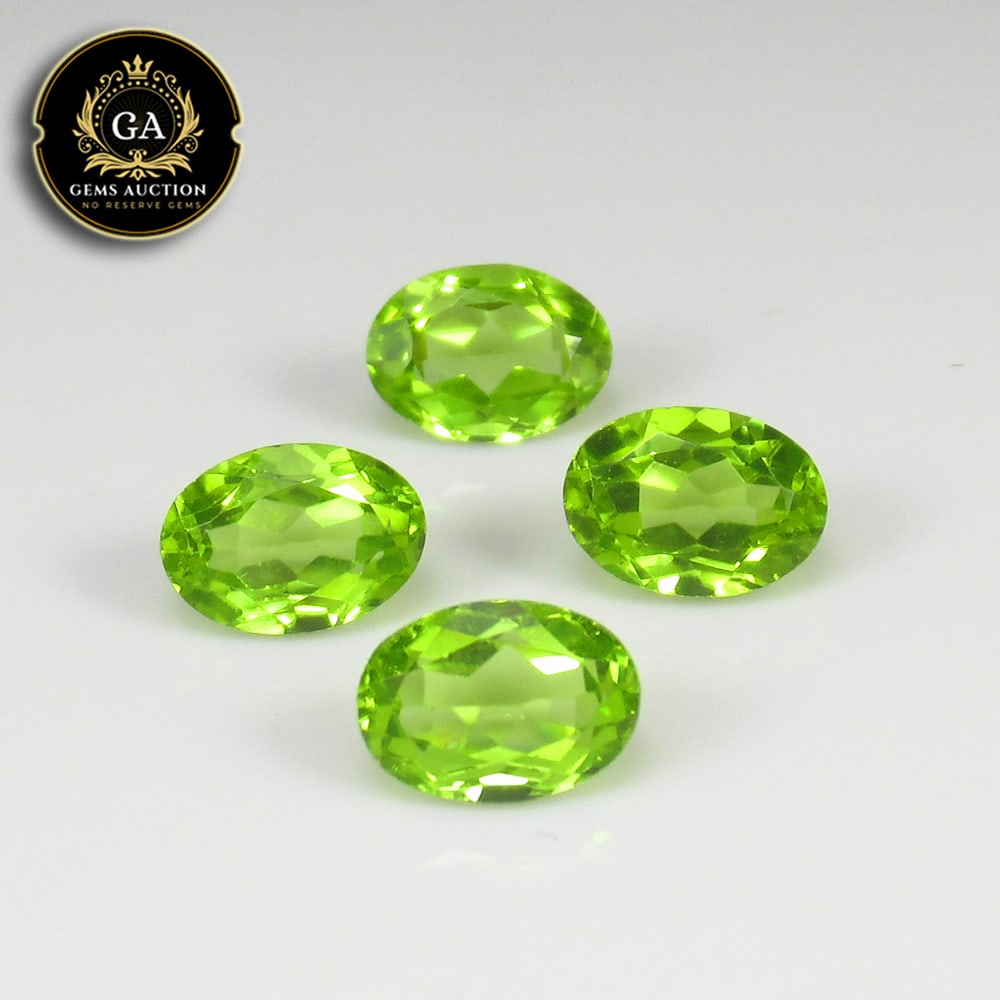 4.35 Ct Natural Parrot Green Peridot Oval Set: Weight - 4.35 Ct / Size - 7.0x5.0 - 7.2x5.2 mm / 4 Pc's / Shape - Oval Cut / Color - Green / Clarity - VVS / Origin - Pakistan / Treatment - None