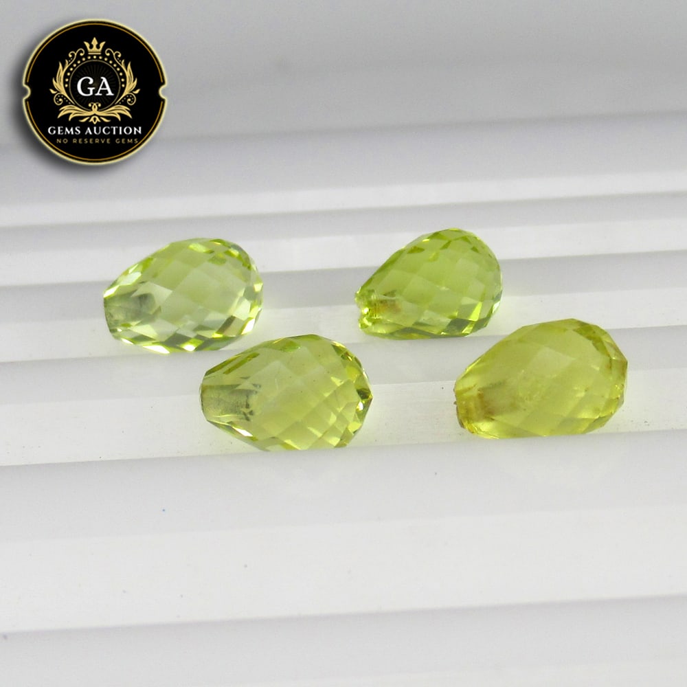 4.84 Ct Natural Loupe Clean Lemon Quartz Pear Drop Beads: Weight - 4.84 Ct / Size - 7.0x5.0 - 7.1x5.1 mm / 4 Pc's / Shape - Pear Drop Beads / Clarity - VVS / Origin - Brazil / Treatment - None