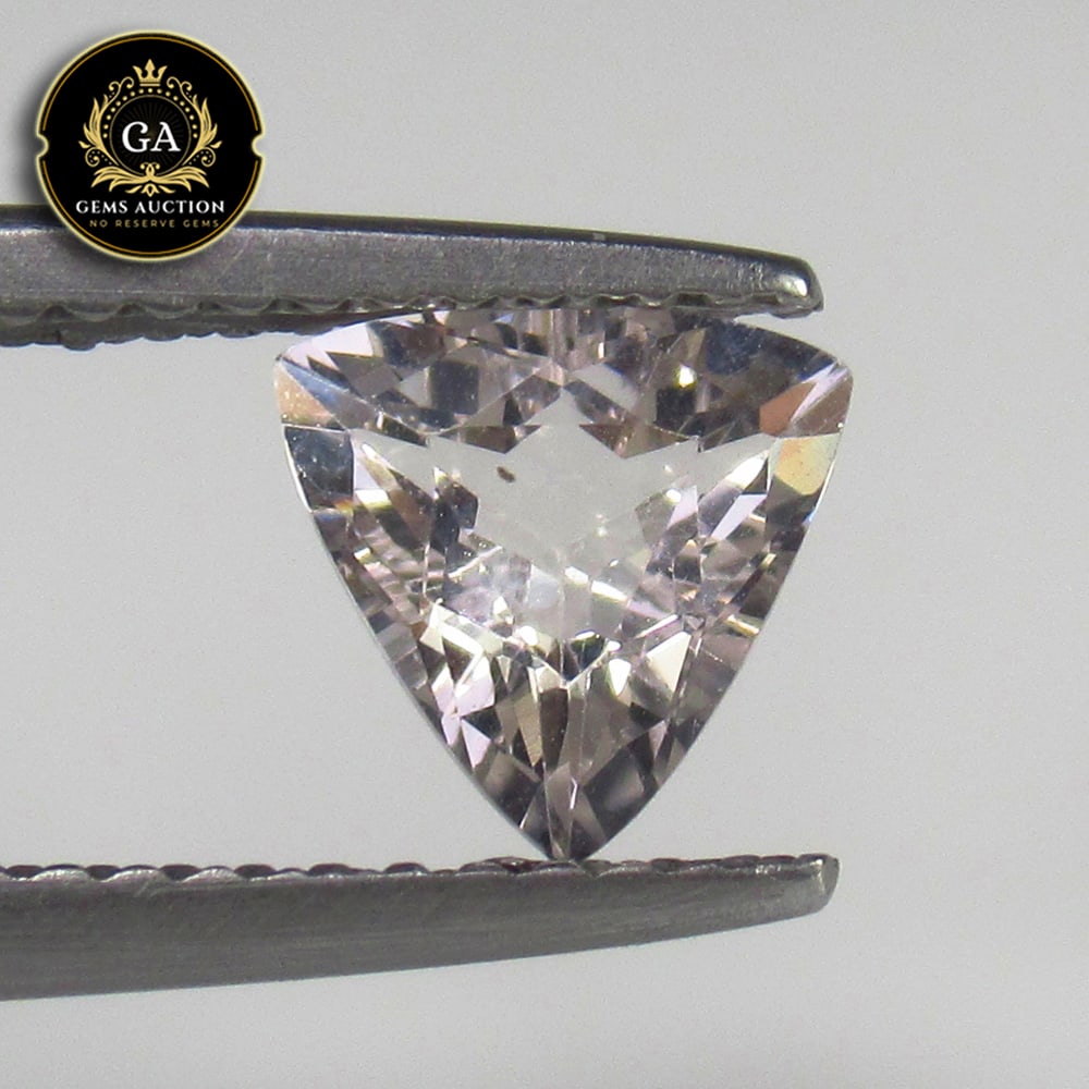 0.77 Ct Untretaed Natural Peach Pink Morganite Trillion Cut: Weight - 0.77 Ct / Size - 6.40 x 6.40 x 3.50 mm / Shape - Trillion Cut / Color - Light Pink / Clarity - VVS / Origin - Mozambique / Treatment - None