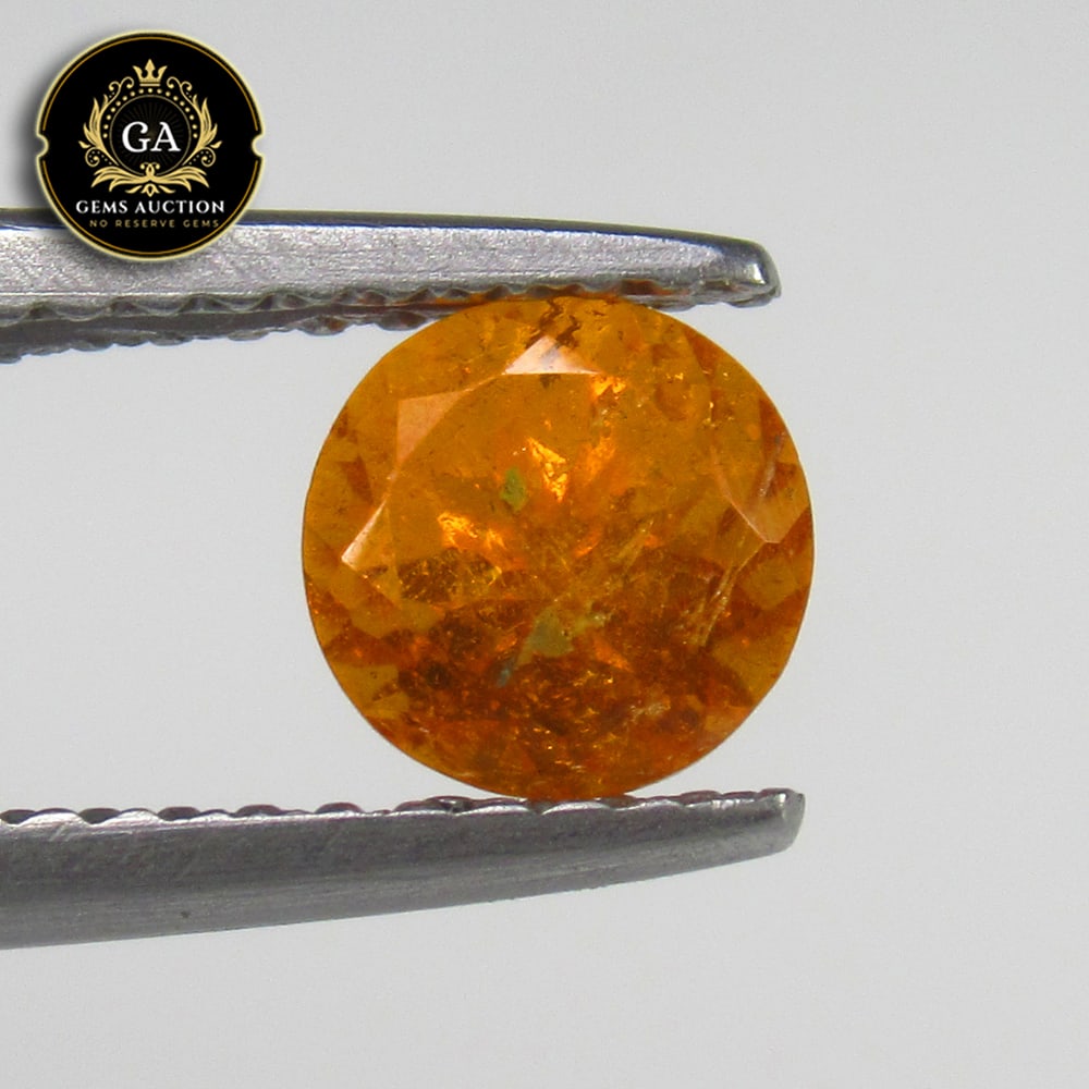 1.12 Ct Natural Fanta Orange Spessarite Garnet Round Cut: Weight - 1.12 Ct / Size - 5.50 x 5.50 x 4.50 mm / Shape - Round Cut / Clarity - SI / Origin - Madagascar / Treatment - None