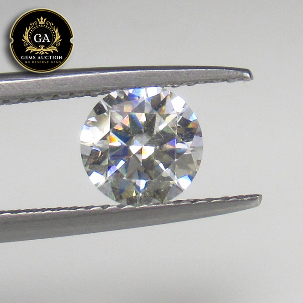 0.93 Ct Lab Created Moissanite Round Diamond Cut: Weight - 0.93 Ct / Size - 6.30 x 6.30 x 4.10 mm / Shape - Round Cut / Color - White / Clarity - VVS / Origin - Turkey / Treatment - Lab Created