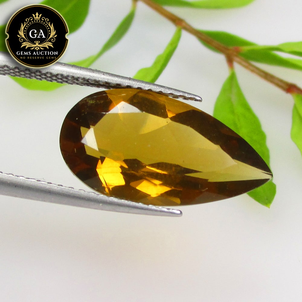 4.98 Ct Natural Bi-Color Lemon Quartz Pear Cut: Weight - 4.98 Ct / Size - 17.10 x 9.20 x 6.10 mm / Clariry - VVS / Top Class Luster / High Class Quality / Excellent Pear Cut / Origin - Africa / Hardness - 7.0 / Treatment - None