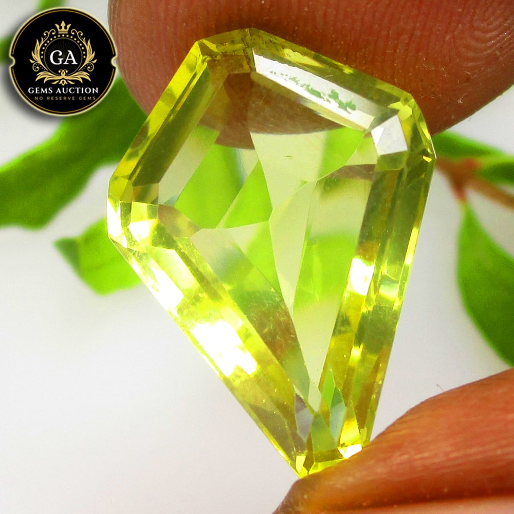 6.85 Ct Natural Loupe Clean Lemon Quartz Fancy Cut: Weight - 6.85 Ct / Size - 17.40 x 12.60 x 6.20 mm / Shape - Fancy Cut / Clarity - VVS / Origin - Brazil / Treatment - None