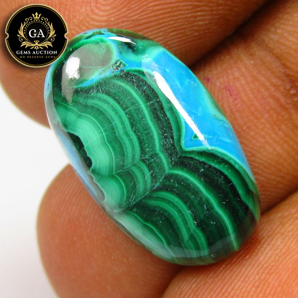 20.24 Ct Natural Elegant Green Malachite Oval Cab: Weight - 20.24 Ct / Size - 20.60 x 12.10 x 6.60 mm / Shape - Oval Cab / Color - Green / Clarity - Opaque / Origin - Rissua / Treatment - None
