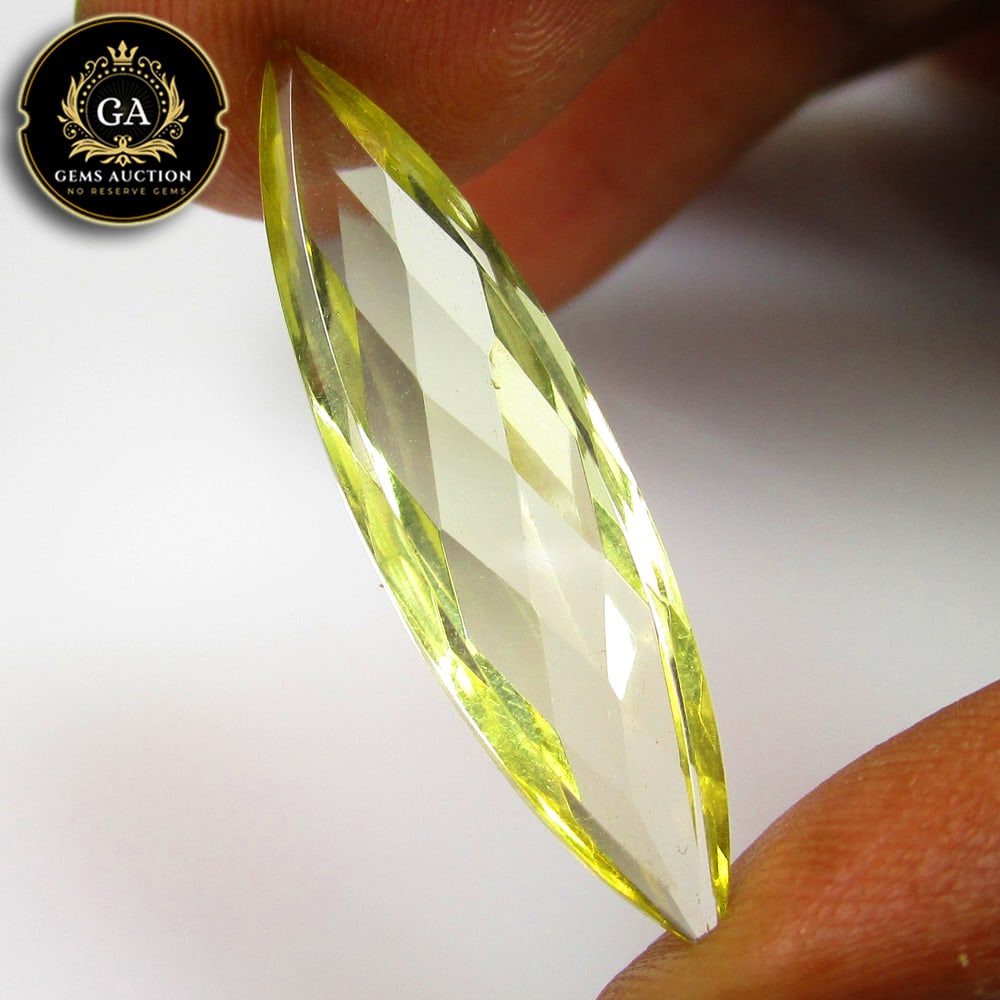 7.81 Ct Natural Loupe Clean Lemon Quartz Marquise Cut: Weight - 7.81 Ct / Size - 31.80 x 8.00 x 5.40 mm / Shape - Marquise Cut / Clarity - VVS / Origin - Brazil / Treatment - None