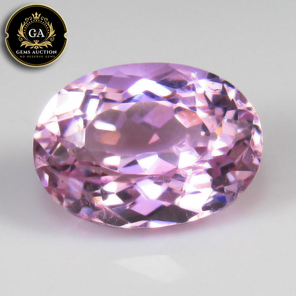 4.87 Ct Natural Sweet Pink Kunzite Oval Cut: Weight - 4.87 Ct / Size -12.00 x 9.00 x 6.50 mm / Shape - Oval Cut / Color - Sweet Pink / Clarity - VVS / Origin - Afghanisthan / Treatment - None
