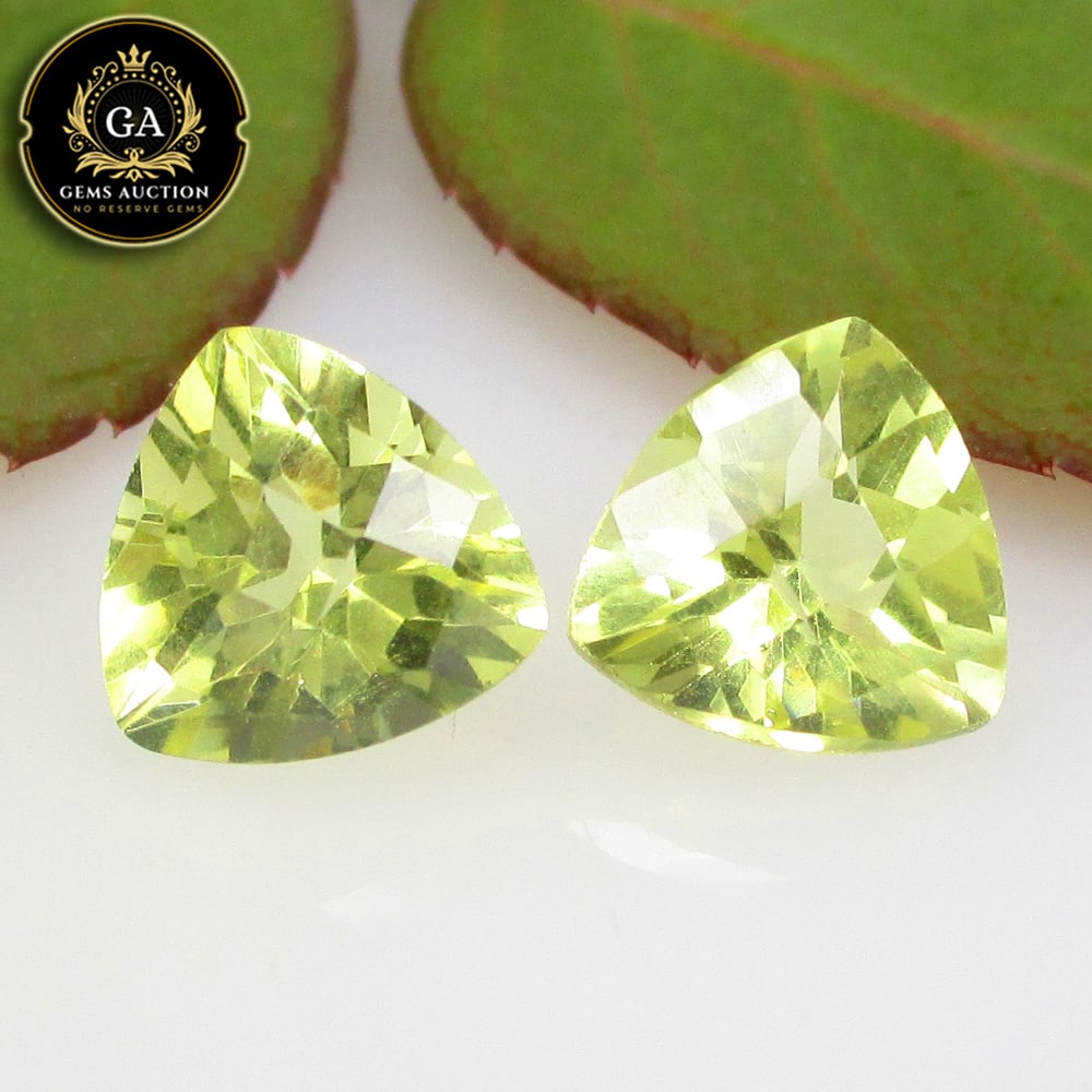 3.76 Ct Natural Loupe Clean Lemon Quartz Trillion Cut Pair: Weight - 3.76 Ct / Size - 8.30 x 8.10 x 6.30 mm / 2 Pc's / Shape - Trillion Cut / Clarity - VVS / Origin - Brazil / Treatment - None