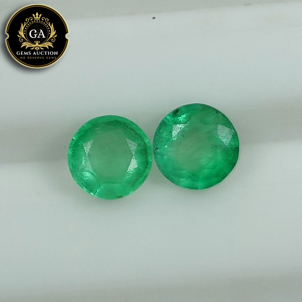 0.92 Ct Natural Leafy Green Emerald Round Cut Pair (1 of 3)