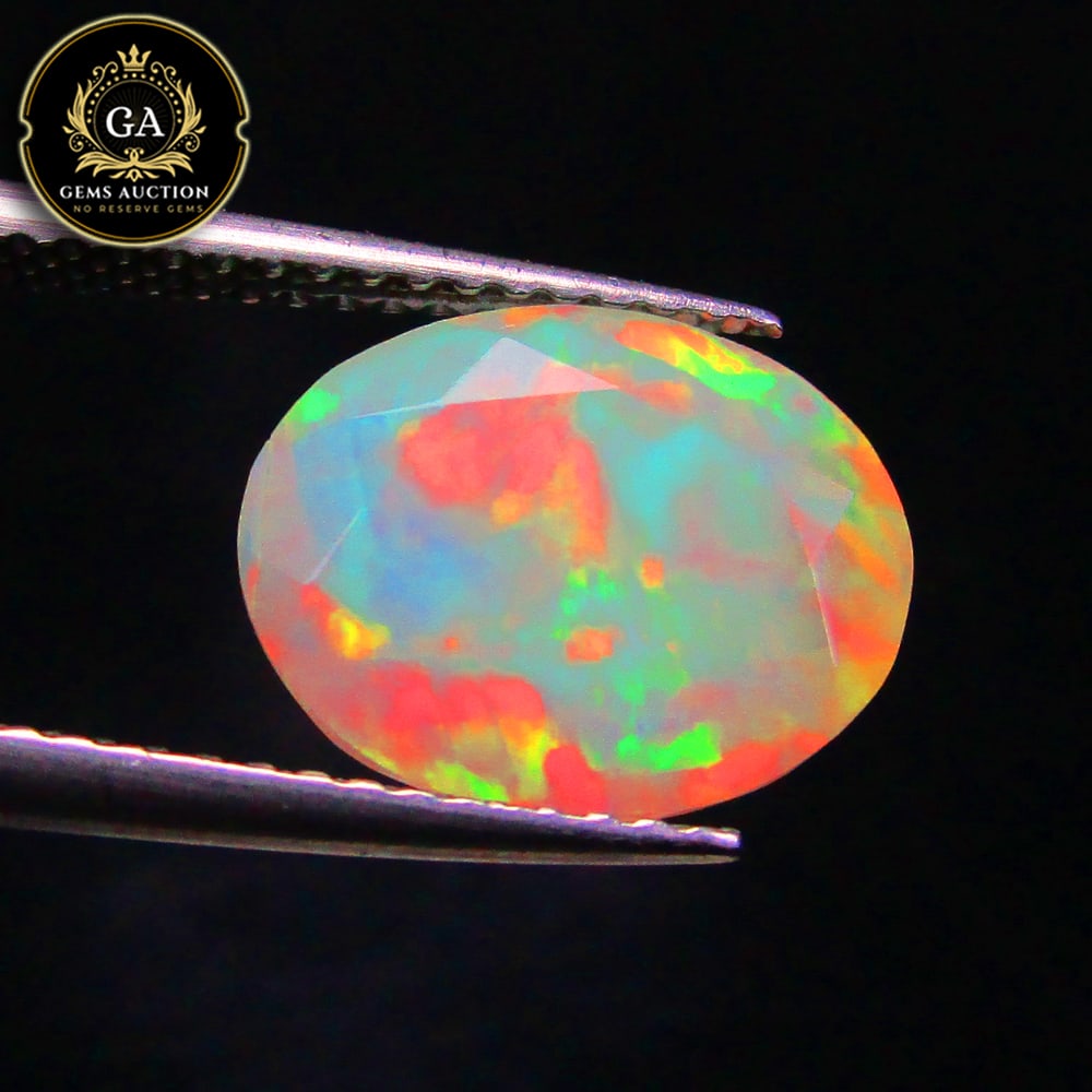 2.16 Ct Natural Multicolor Welo Opal Good Fire Oval Cut (1 of 3)