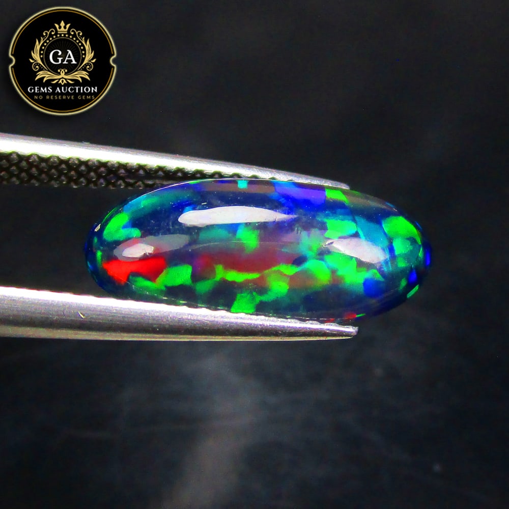 1.85 Ct Natural Black Flashing Fire Opal Oval Cab (1 of 3)