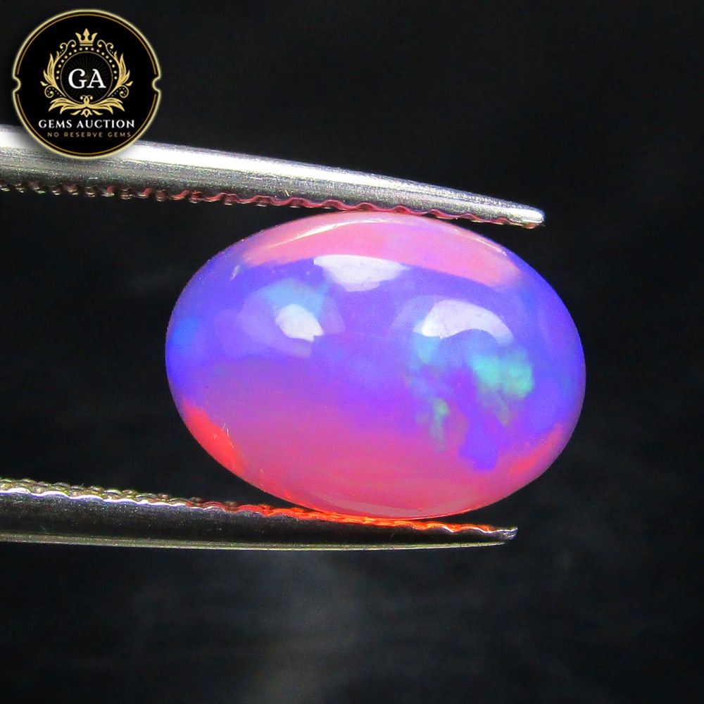 1.66 Ct Natural Pink Fire Opal Oval Cab (1 of 3)