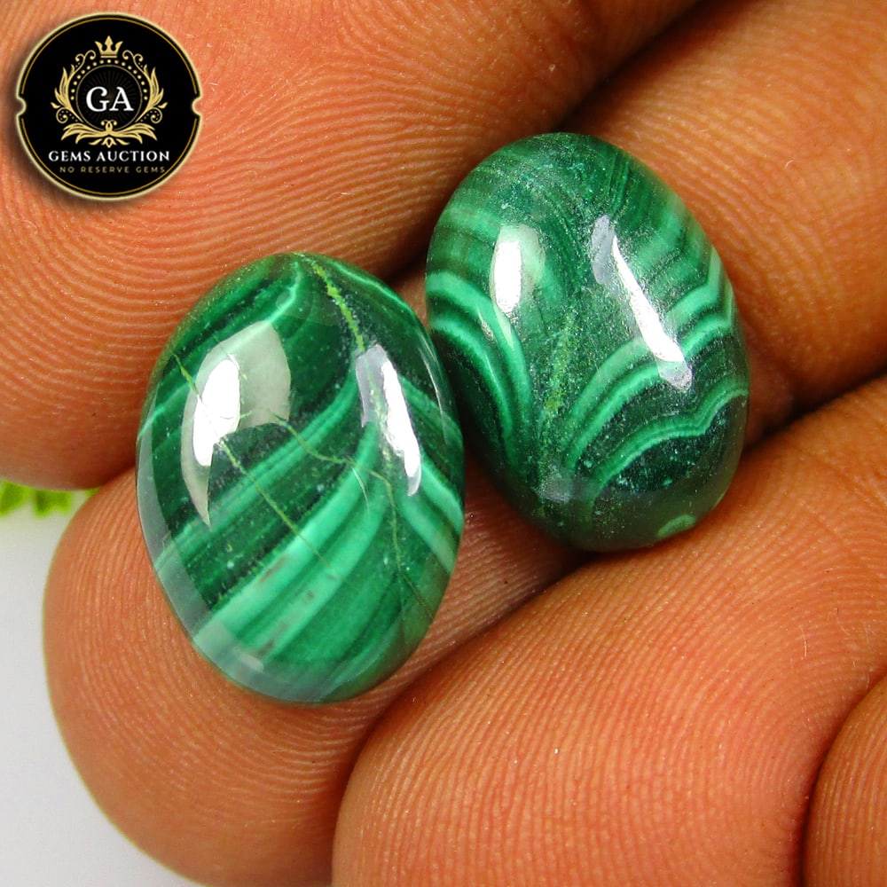 15.80 Ct Natural Elegant Green Malachite Oval Cab Pair: Weight - 15.80 Ct / Size - 14.00 x 10.10 x 4.70 mm / 2 Pc's / Shape - Oval Cab / Color - Green / Clarity - Opaque / Origin - Rissua / Treatment - None