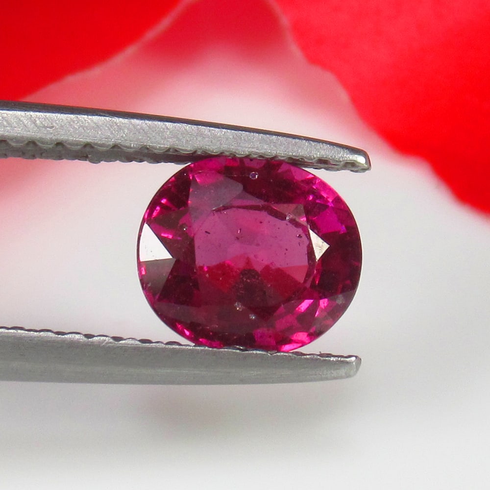 1.41 Ct Natural Rose Garnet Oval Cut: Weight - 1.41 Ct / Size - 7.00 x 6.20 x 4.10 mm / Shape - Oval Cut / Clarity - VVS / Origin - Nigeria / Treatment - None