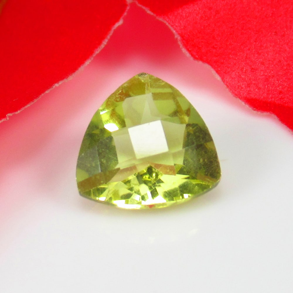 1.51 Ct Natural Loupe Clean Lemon Quartz Trillion Cut: Weight - 1.51 Ct / Size - 8.40 x 8.20 x 4.90 mm / Shape - Trillion Cut / Clarity - VVS / Origin - Brazil / Treatment - None