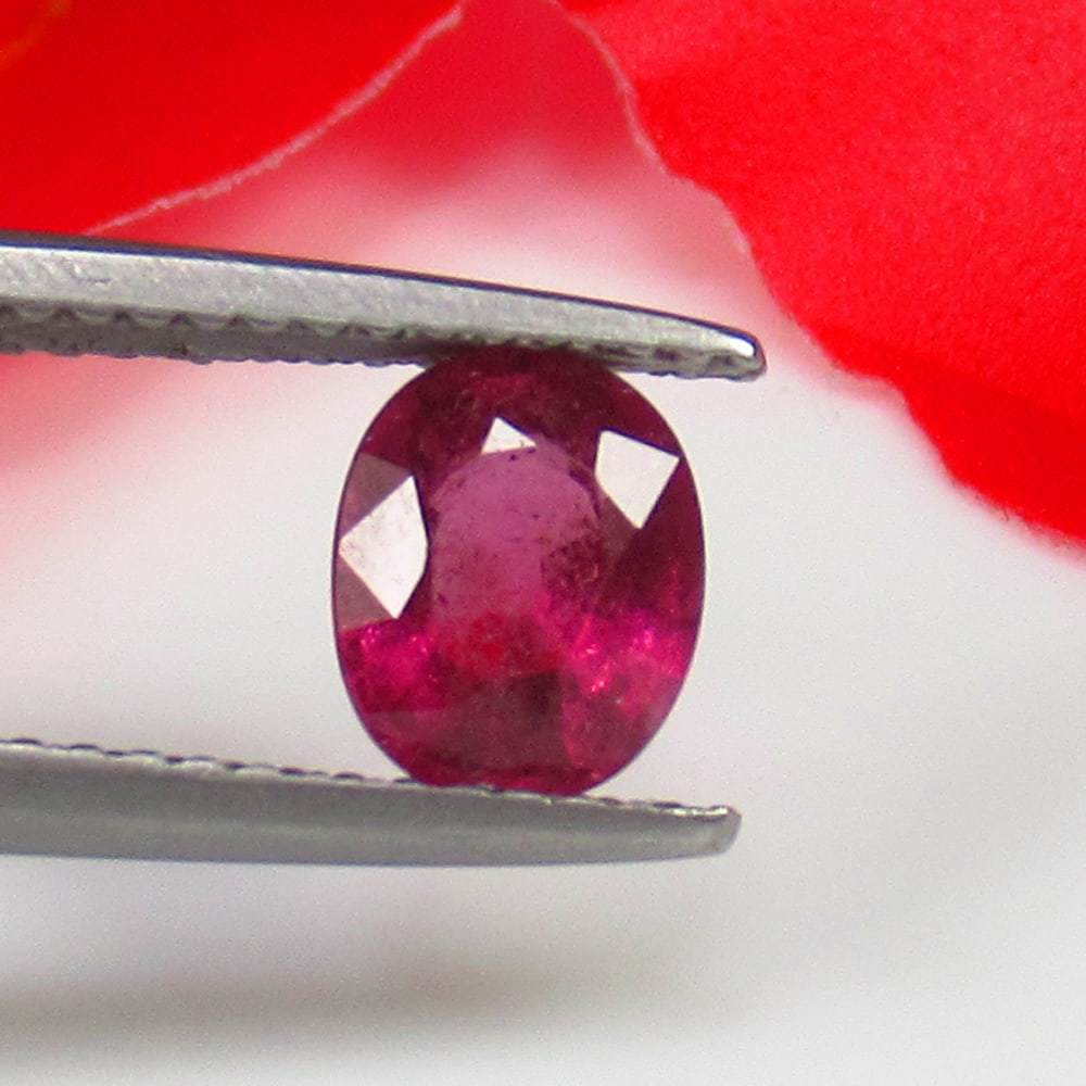1.06 Ct Natural Rose Garnet Oval Cut: Weight - 1.06 Ct / Size - 7.00 x 5.50 x 3.30 mm / Shape - Oval Cut / Clarity - VVS / Origin - Nigeria / Treatment - None