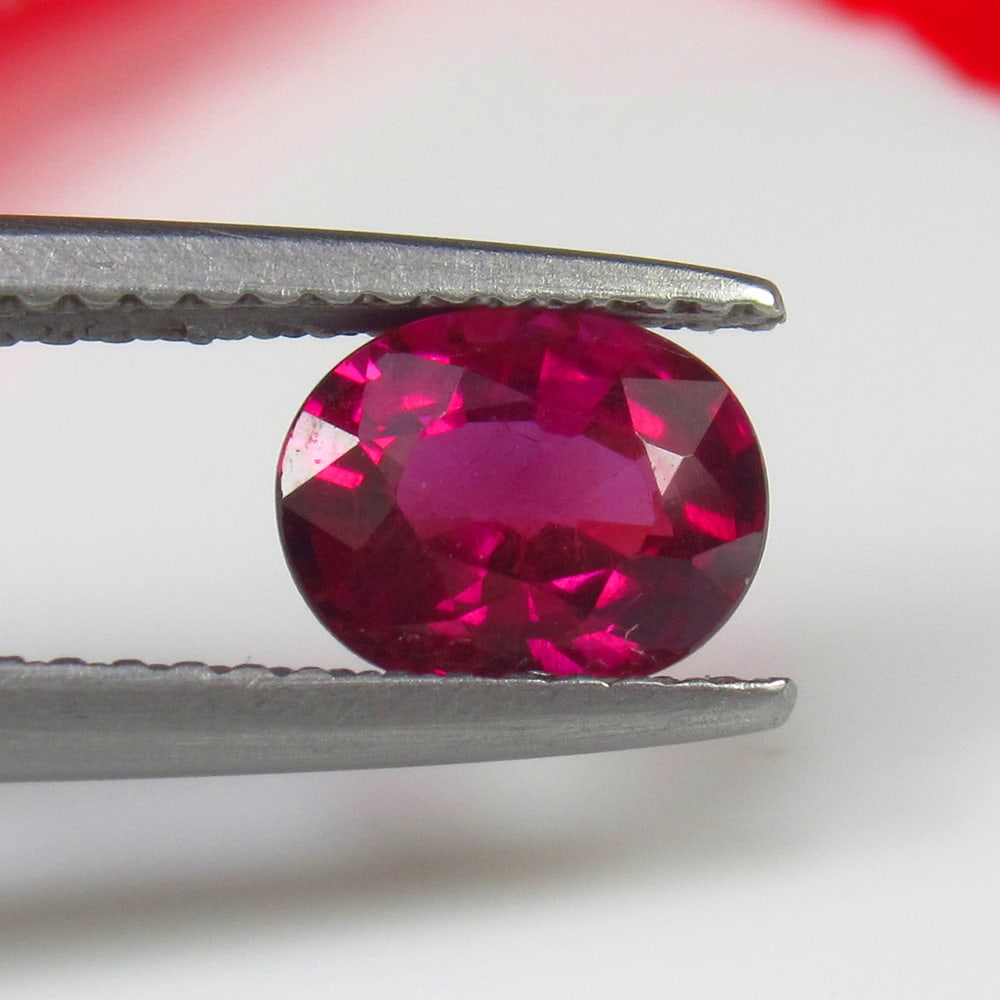 1.25 Ct Natural Rose Garnet Oval Cut: Weight - 1.25 Ct / Size - 7.00 x 5.70 x 3.60 mm / Shape - Oval Cut / Clarity - VVS / Origin - Nigeria / Treatment - None