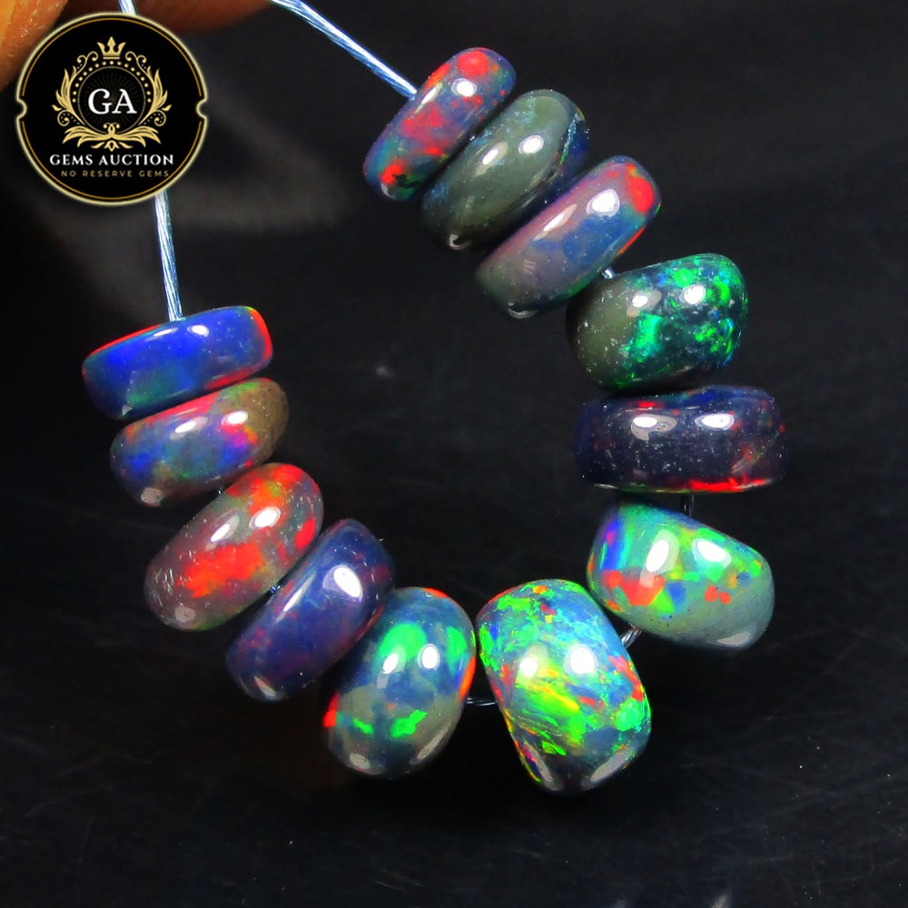 4.31 Ct Natural Black Flashing Fire Opal Round Beads (1 of 3)