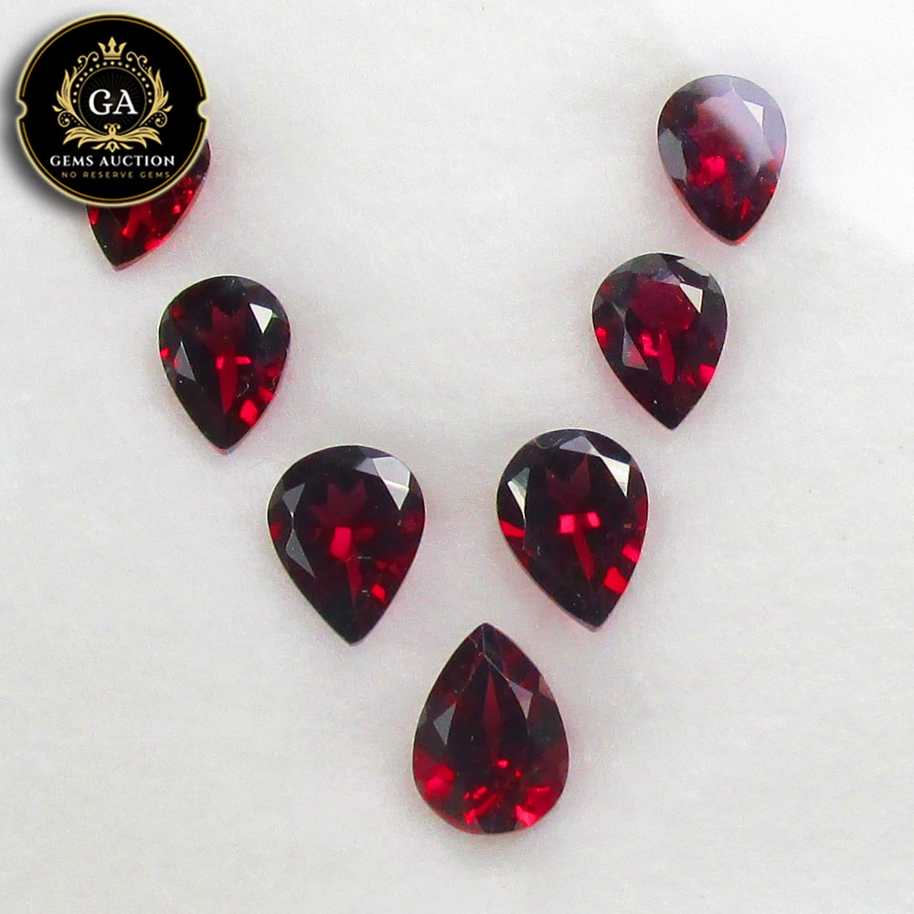 7.53 Ct Natural Rhodolite Garnet Almandine Pear Cut Set: Weight - 7.53 Ct / Size - 7.0x5.1 - 7.9x5.8 mm / 7 Pc's / Shape - Pear Cut / Clarity - VVS / Origin - Nigeria / Treatment - None