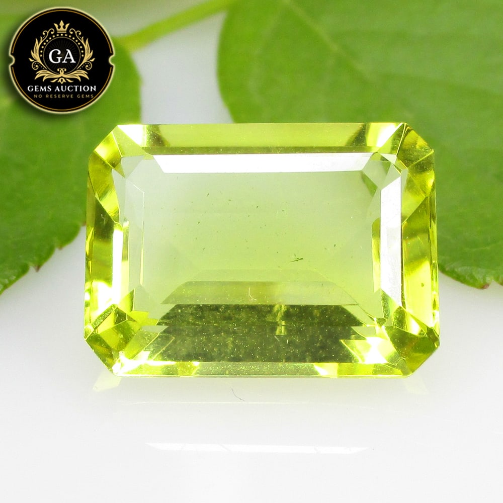 9.09 Ct Natural Loupe Clean Lemon Quartz Octagon Cut: Weight - 9.09 Ct / Size - 15.20 x 11.10 x 7.10 mm / Shape - Octagon Cut / Clarity - VVS / Origin - Brazil / Treatment - None