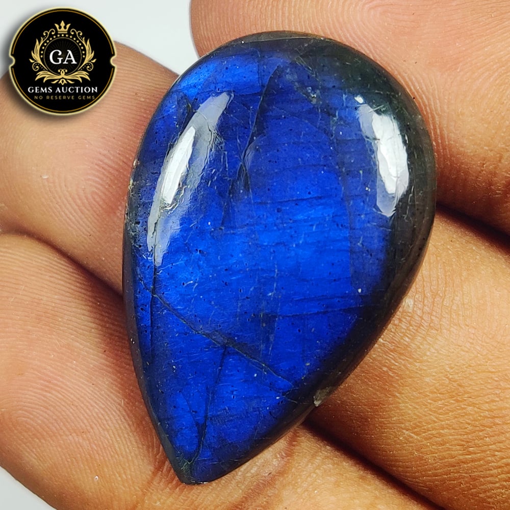 26.68 Ct Natural Labradorite Pear Cab: Weight - 26.68 Ct / Size - 33.00 x 20.60 x 5.60 mm / Shape - Excellent Pear Cabochon / Clarity - Opaque / Origin - Africa / Treatment - None