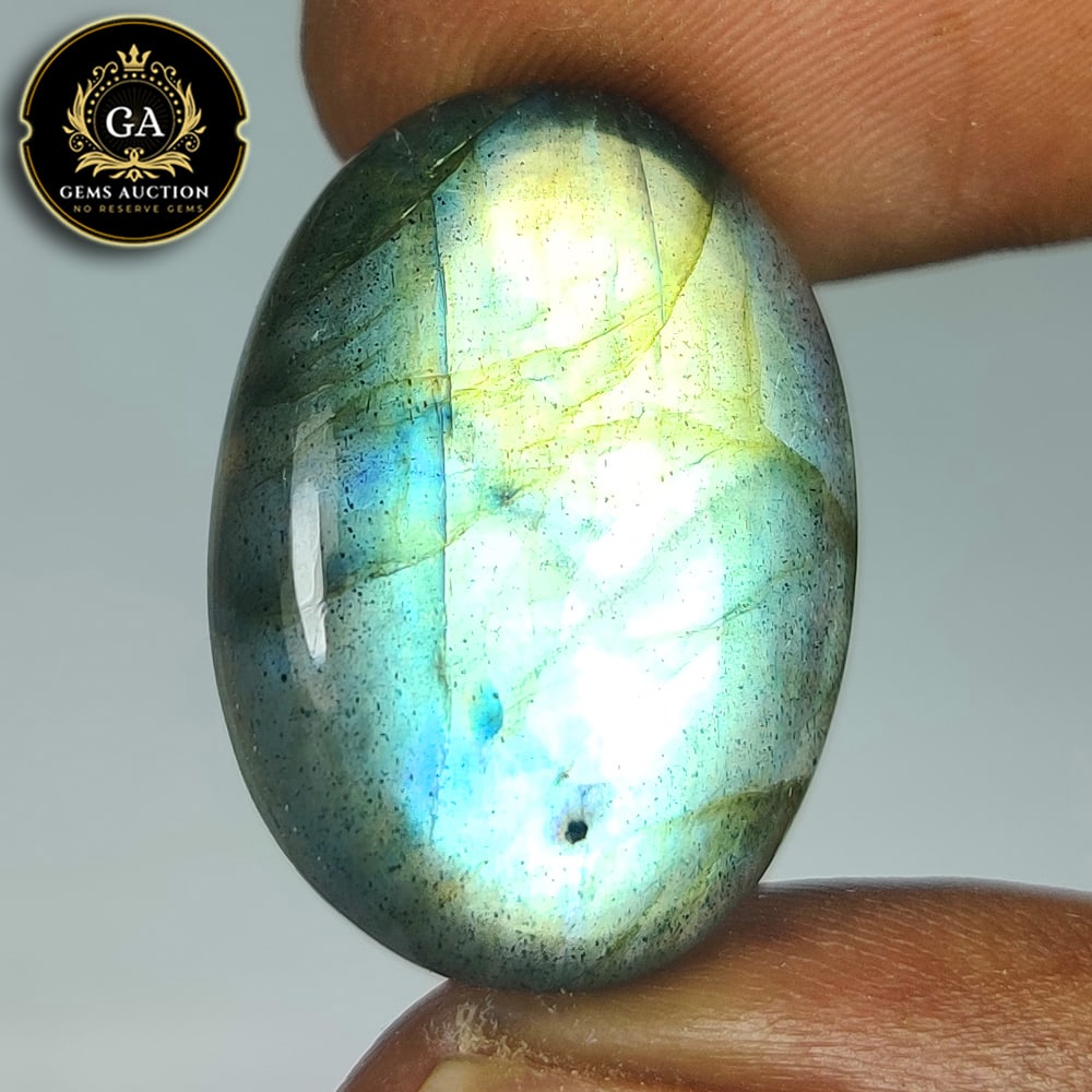 21.17 Ct Natural Labradorite Oval Cab: Weight - 21.17 Ct / Size - 25.00 x 17.10 x 6.10 mm / Shape - Excellent Oval Cabochon / Clarity - Opaque / Origin - Africa / Treatment - None