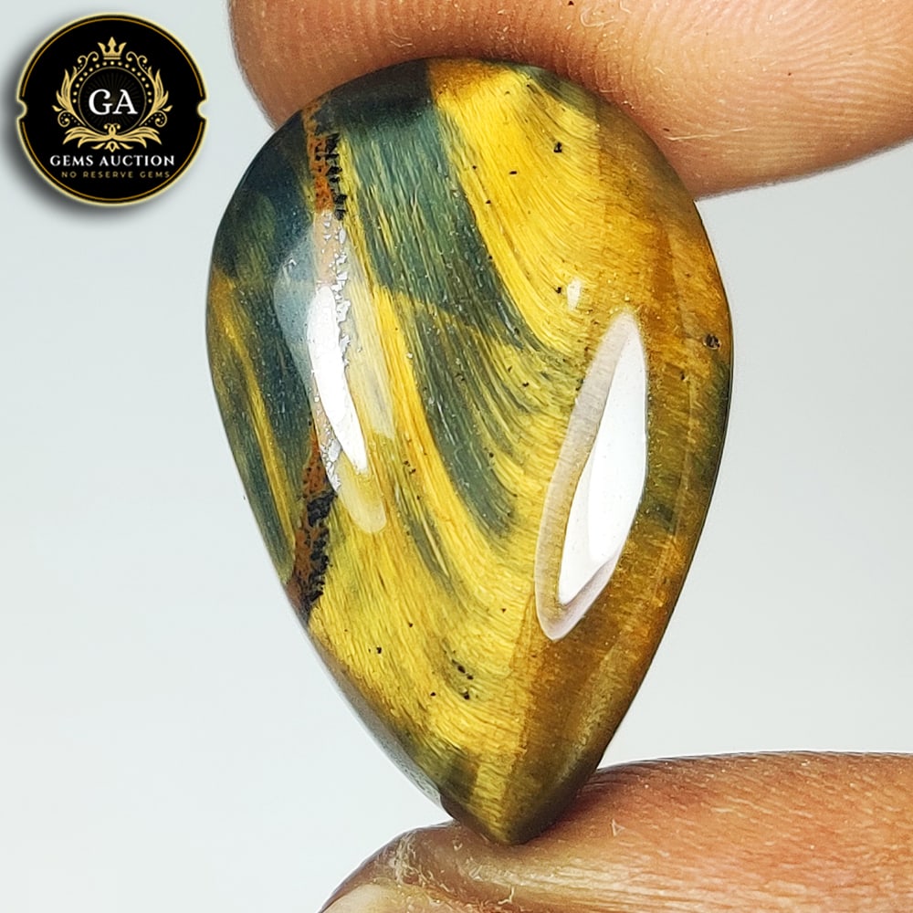 18.02 Ct Natural Tiger's Eye Pear Cab (1 of 3)