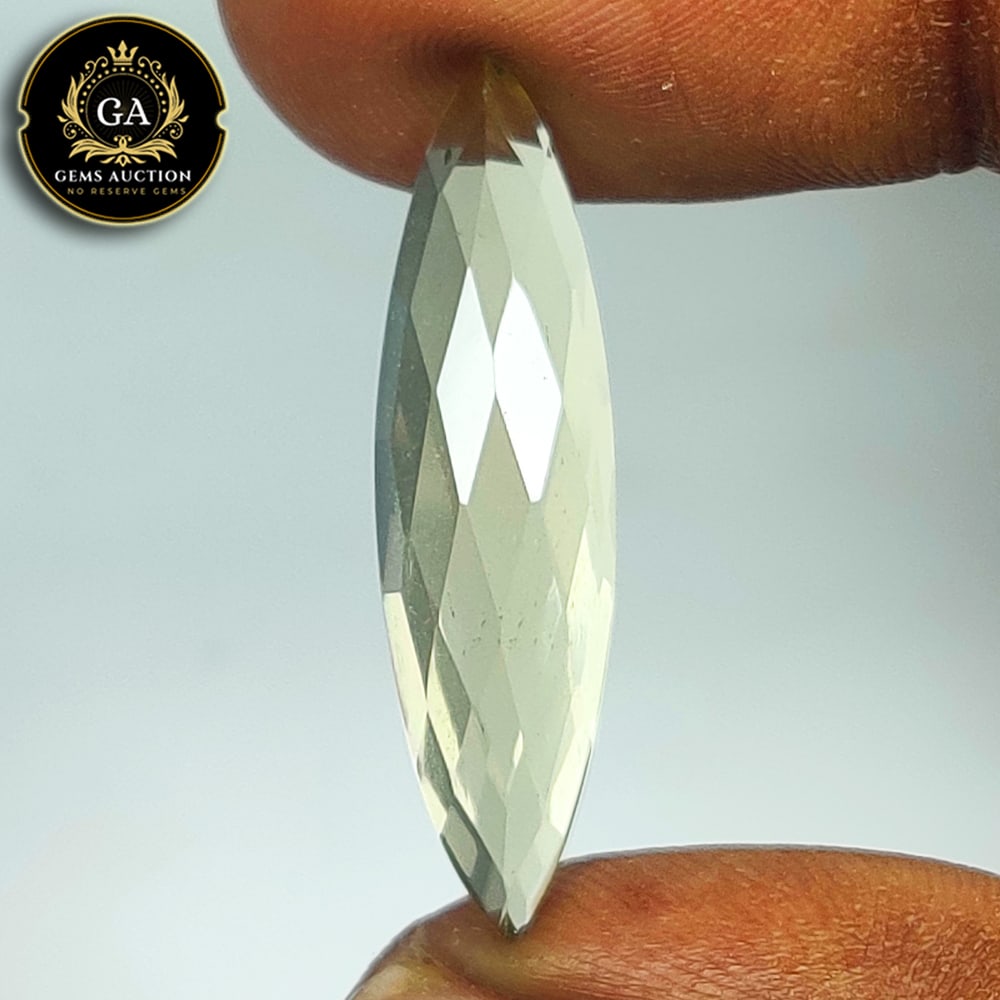 9.33 Ct Natural Lemon Quartz Marquise Cut: Weight - 9.33 Ct / Size - 31.00 x 18.20 x 5.60 mm / Shape - Marquise Cut / Clarity - VVS / Origin - Brazil / Treatment - None