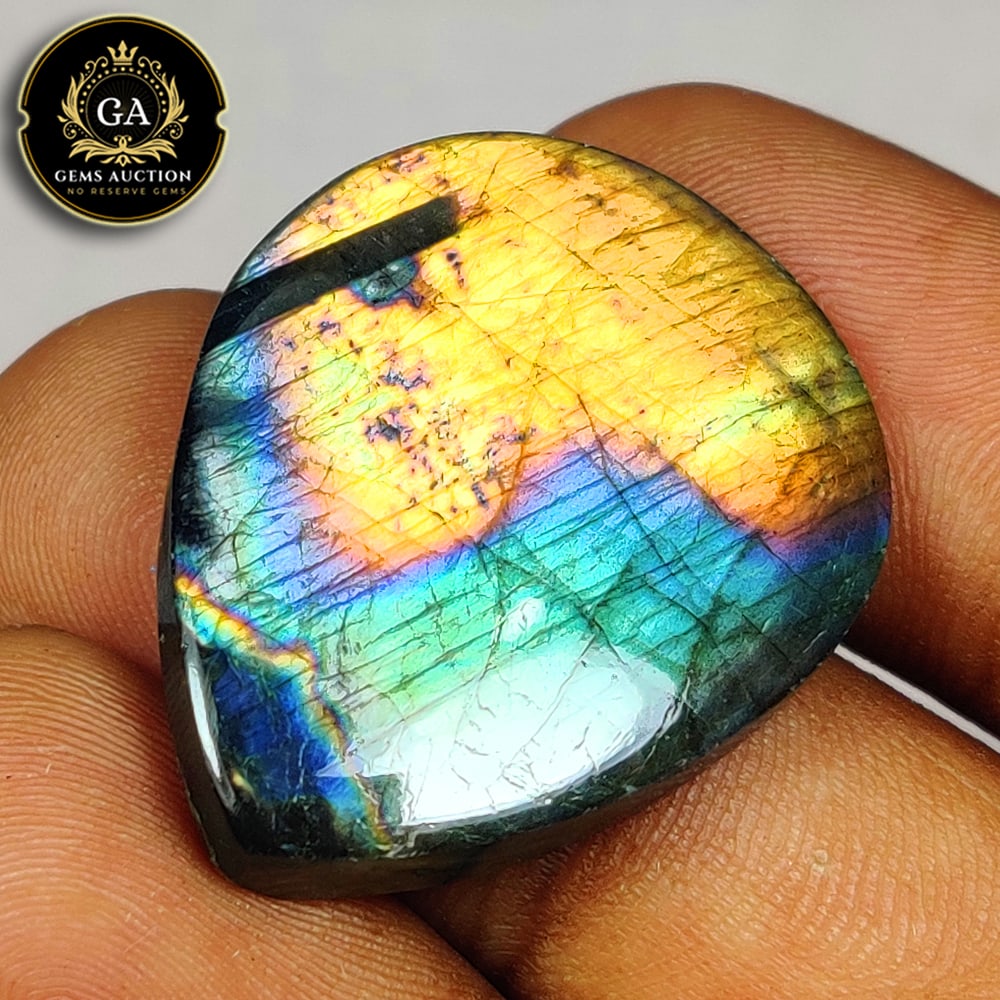 33.28 Ct Natural Labradorite Pear Cab: Weight - 33.28 Ct / Size - 31.00 x 25.00 x 5.90 mm / Shape - Excellent Pear Cabochon / Clarity - Opaque / Origin - Africa / Treatment - None
