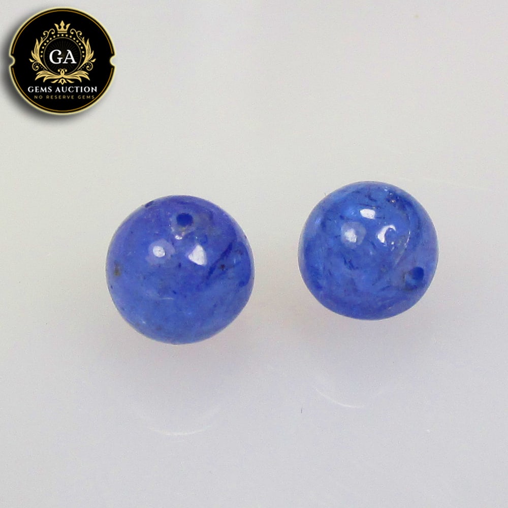 2.58 Ct Natural Tanzanite Round Ball Beads: Weight - 2.58 Ct / Size- 5.20 - 5.60 mm / 2 Pc's / Shape - Round Beads / Clarity - SI / Origin - Tanzania / Treatment - Standard Heated