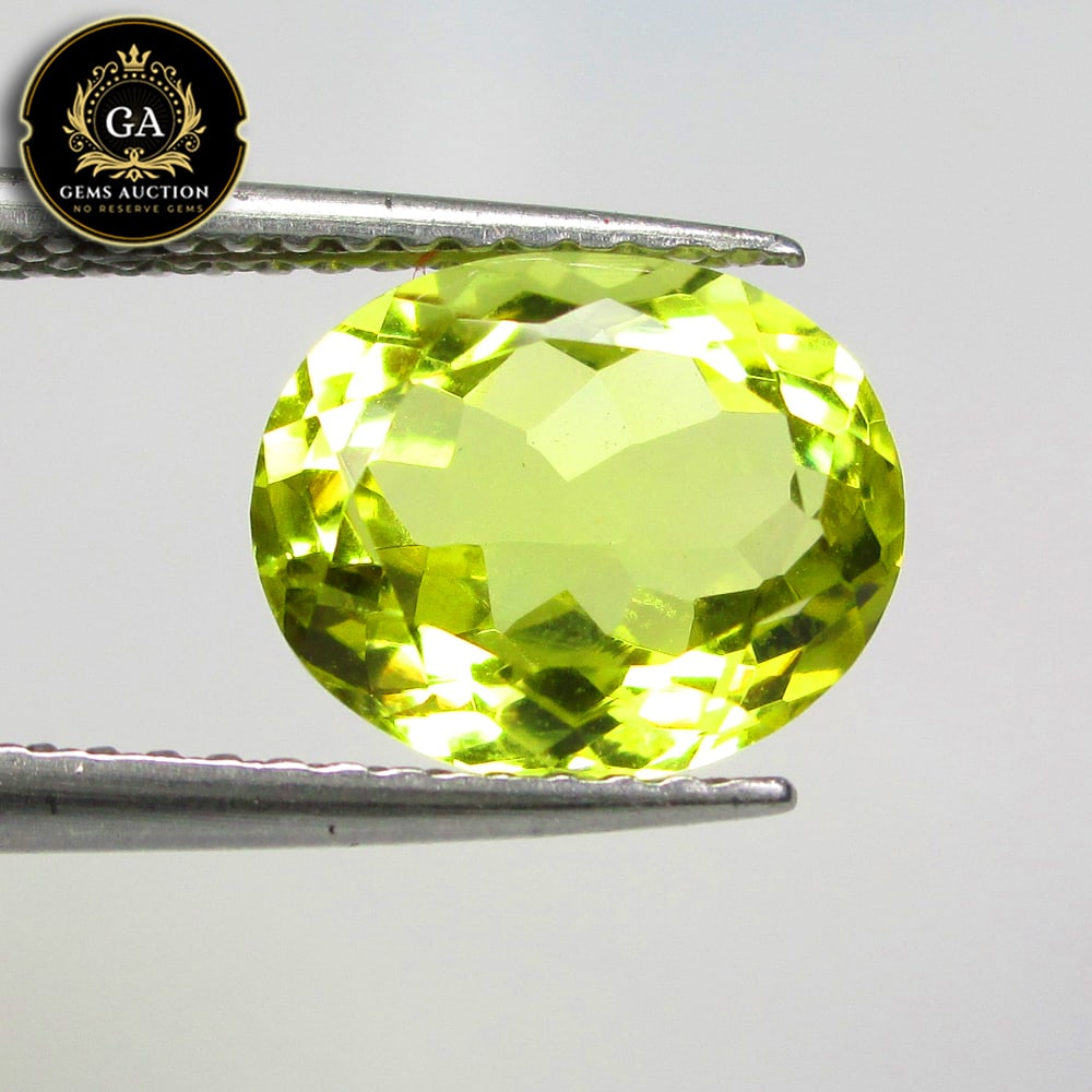2.32 Ct Natural Lemon Quartz Oval Cut: Weight - 2.32 Ct / Size - 9.40 x 7.80 x 5.40 mm / Shape - Oval Cut / Clarity - Opaque / Origin - Brazil / Treatment - None