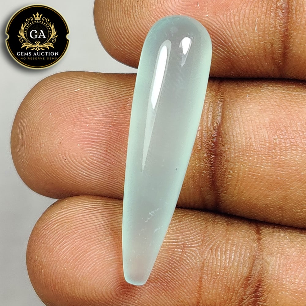 14.03 Ct Natural Onyx Long Pear Drop: Weight - 14.03 Ct / Size -33.00 x 8.20 x 8.20 mm / Shape - Pear Drop / Clarity - OPaque / Origin - Africa / Treatment - None