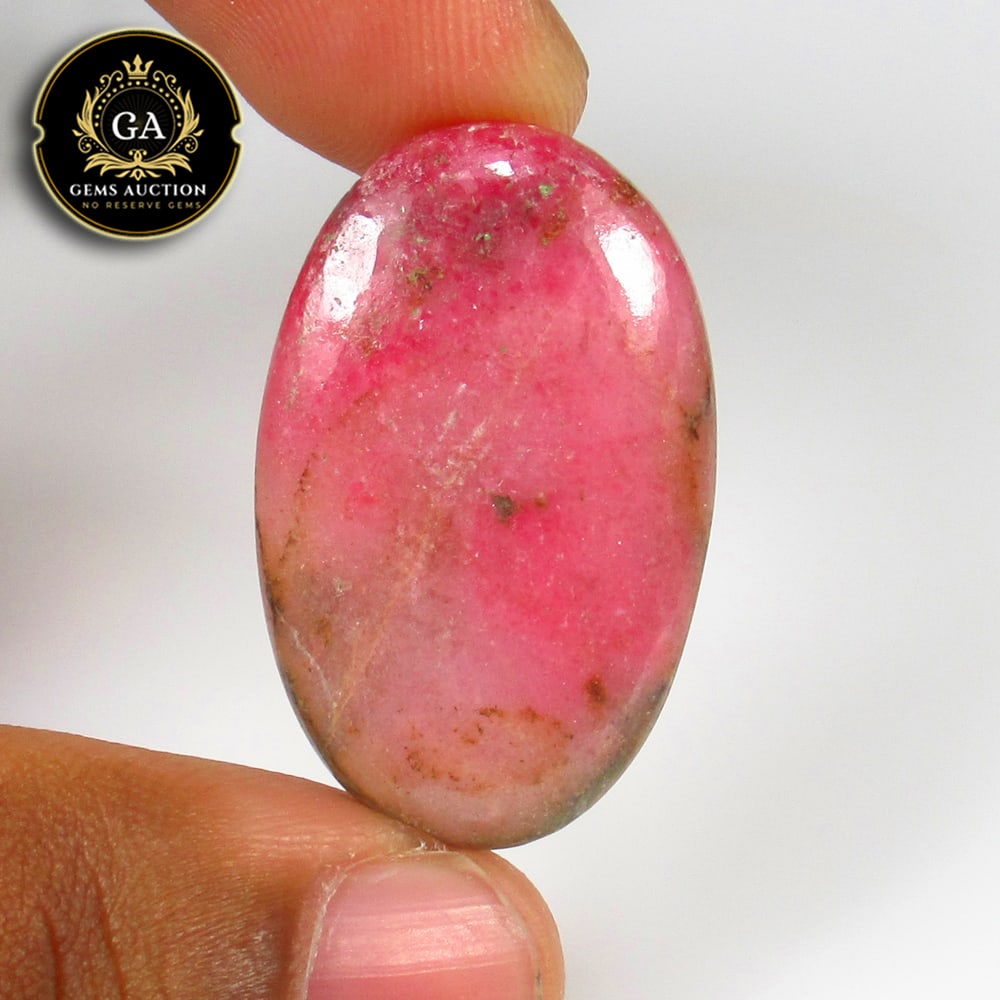 27.64 Ct Natural Rhodonite Oval Cab (1 of 2)