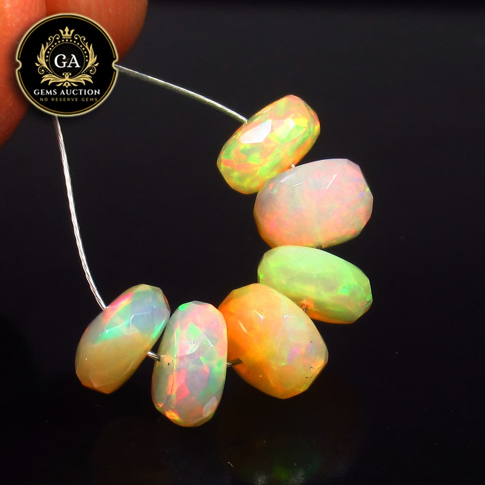 4.72 Ct Natural Drilled Multi-color Opal Good Fire Round Beads: Weight - 4.72 Ct / Size - 6.00 - 6.80 mm / 6 Pc's / Shape -Round Beads / Color - Multicolor / Clarity - Transparent / Origin - Ethiopia / Treatment - None