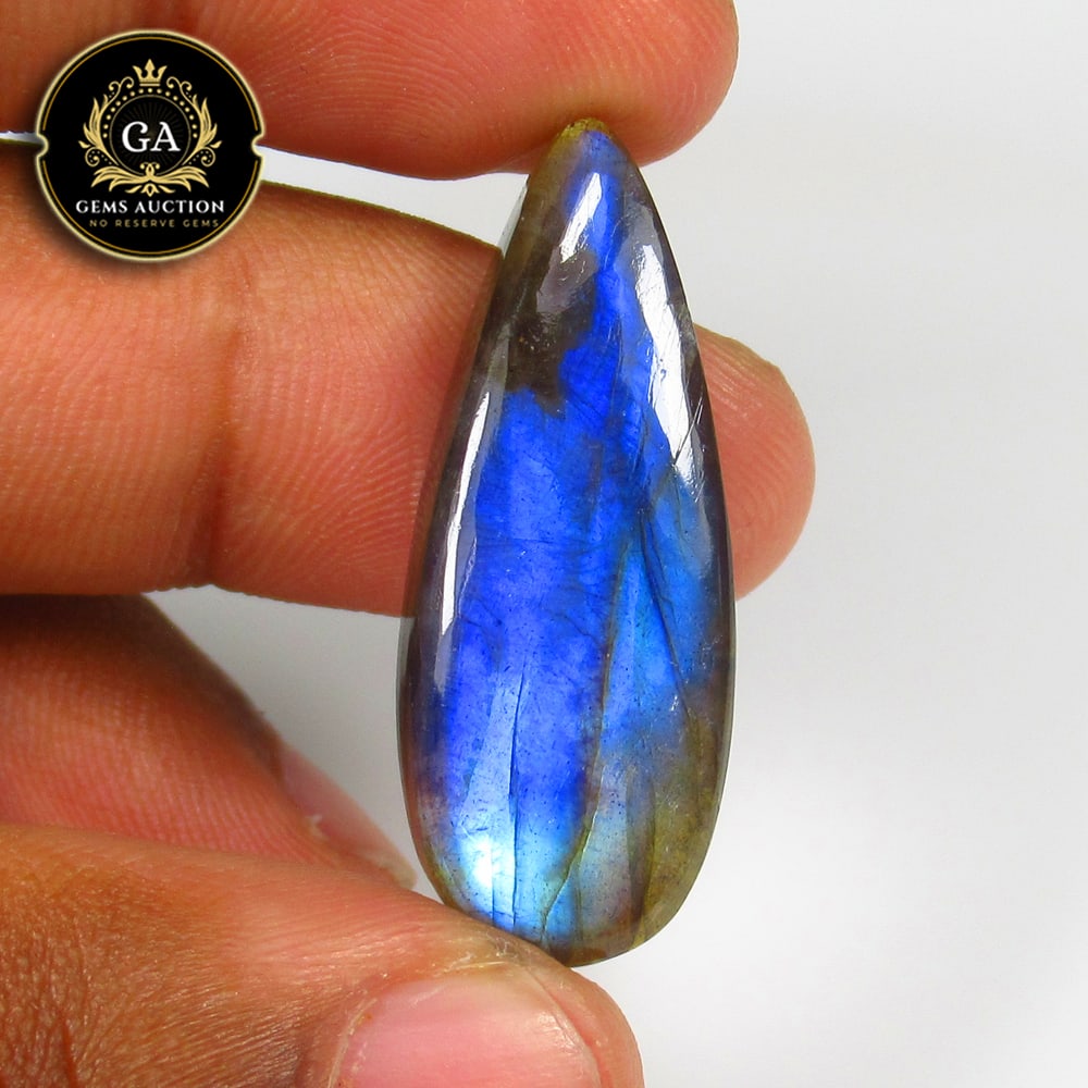 26.88 Ct Natural Blue Shaded Labradorite Pear Cab: Weight - 26.88 Ct / Size - 35.00 x 13.50 x 6.80 mm / Shape - Excellent Pear Cab / Clarity - Opaque / Origin - Africa / Treatment - None