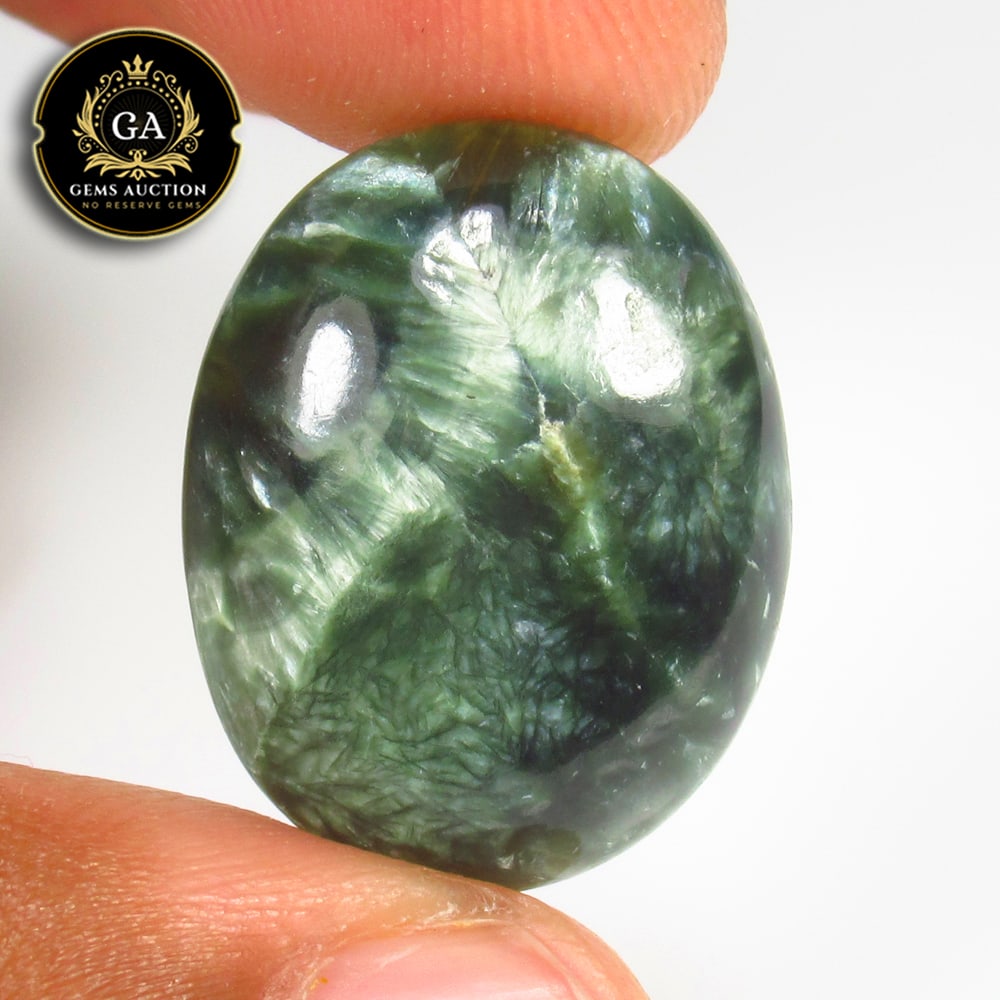 16.07 Ct Natural Seraphinite Oval Cab (1 of 2)