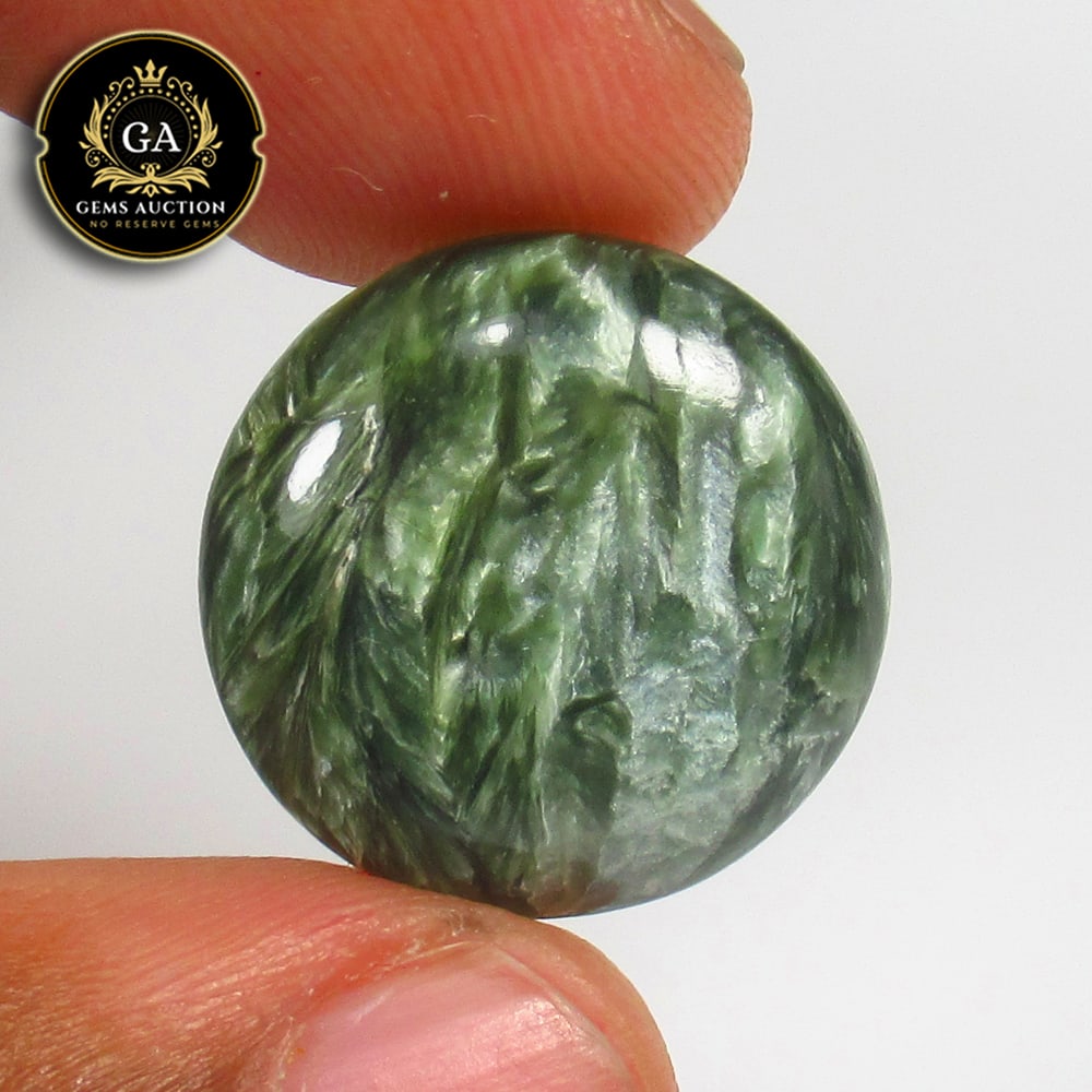 13.18 Ct Natural Seraphinite Round Cab (1 of 2)