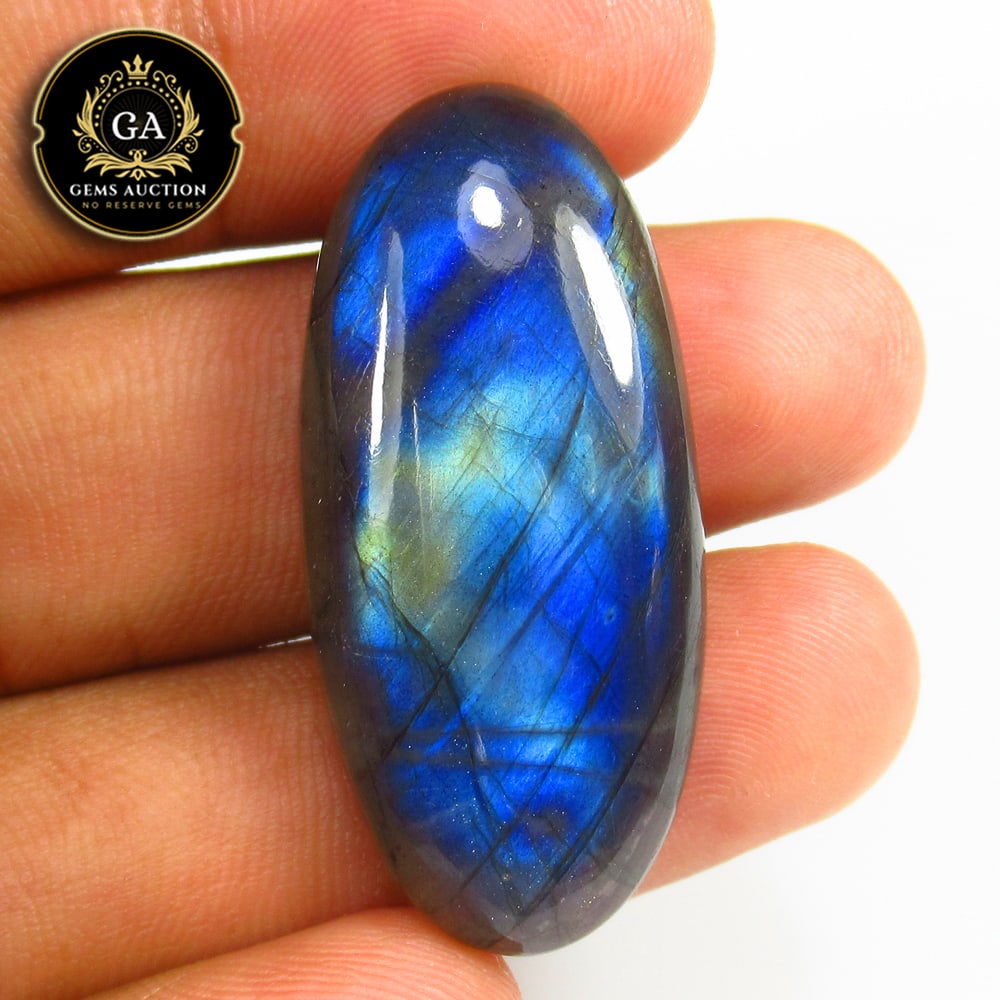 47.79 Ct Natural Blue Shaded Labradorite Oval Cab: Weight - 47.79 Ct / Size - 40.00 x 18.30 x 8.00 mm / Shape - Excellent Oval Cab / Clarity - Opaque / Origin - Africa / Treatment - None